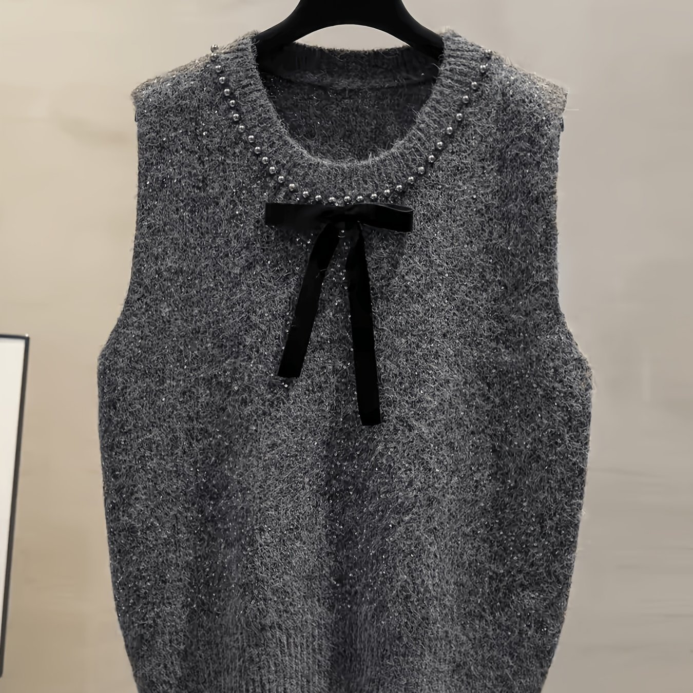 TEMU Nouveau débardeur pour femme automne/hiver, avec de délicates petites perles cloutées le long de l' ronde, et un nœud en ruban ornant la