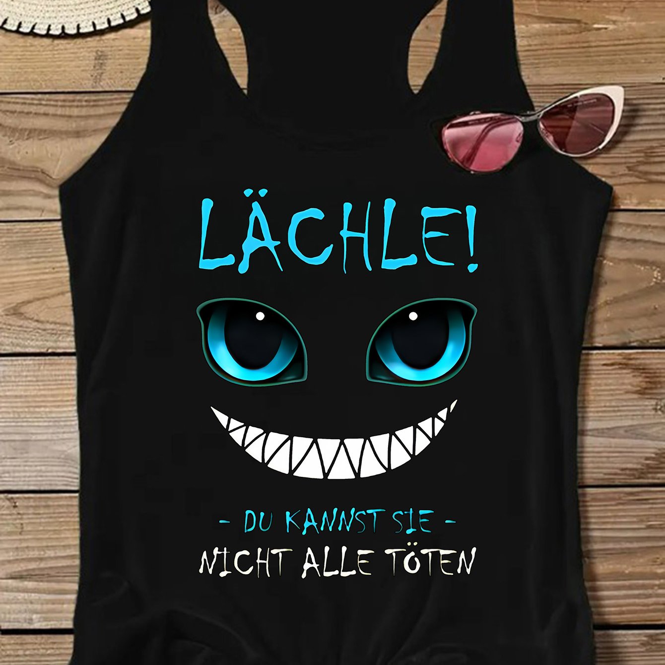Image of German Lächle Du Kannst Sie Alle Nicht Töten Cartoon Print Sleeveless Tank Top, Fashionable Women's Summer Clothing , Women's Top, Polyester Slightly Stretchy Sleeveless Vest