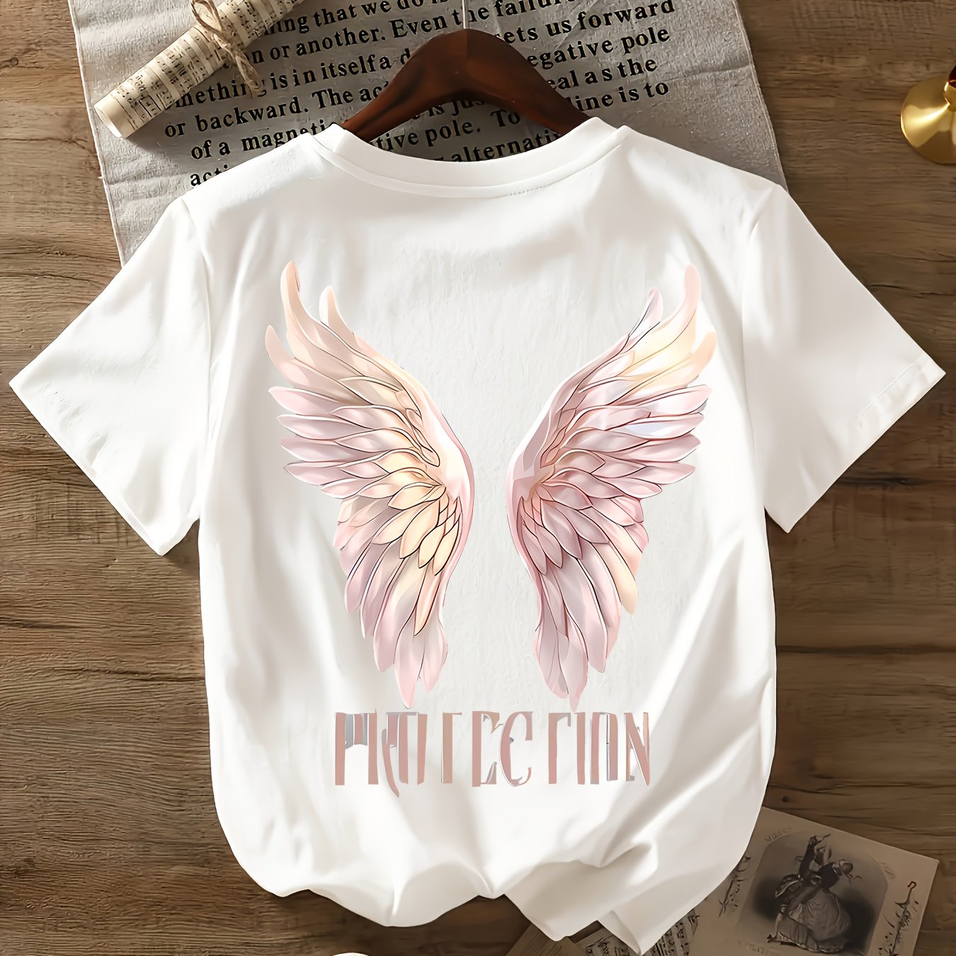 Image of Women's Wing Print T-shirt - Short Sleeve Round Neck Casual Blouse With Wing & Lettering, Machine Washable - Casual Attire Top 6153