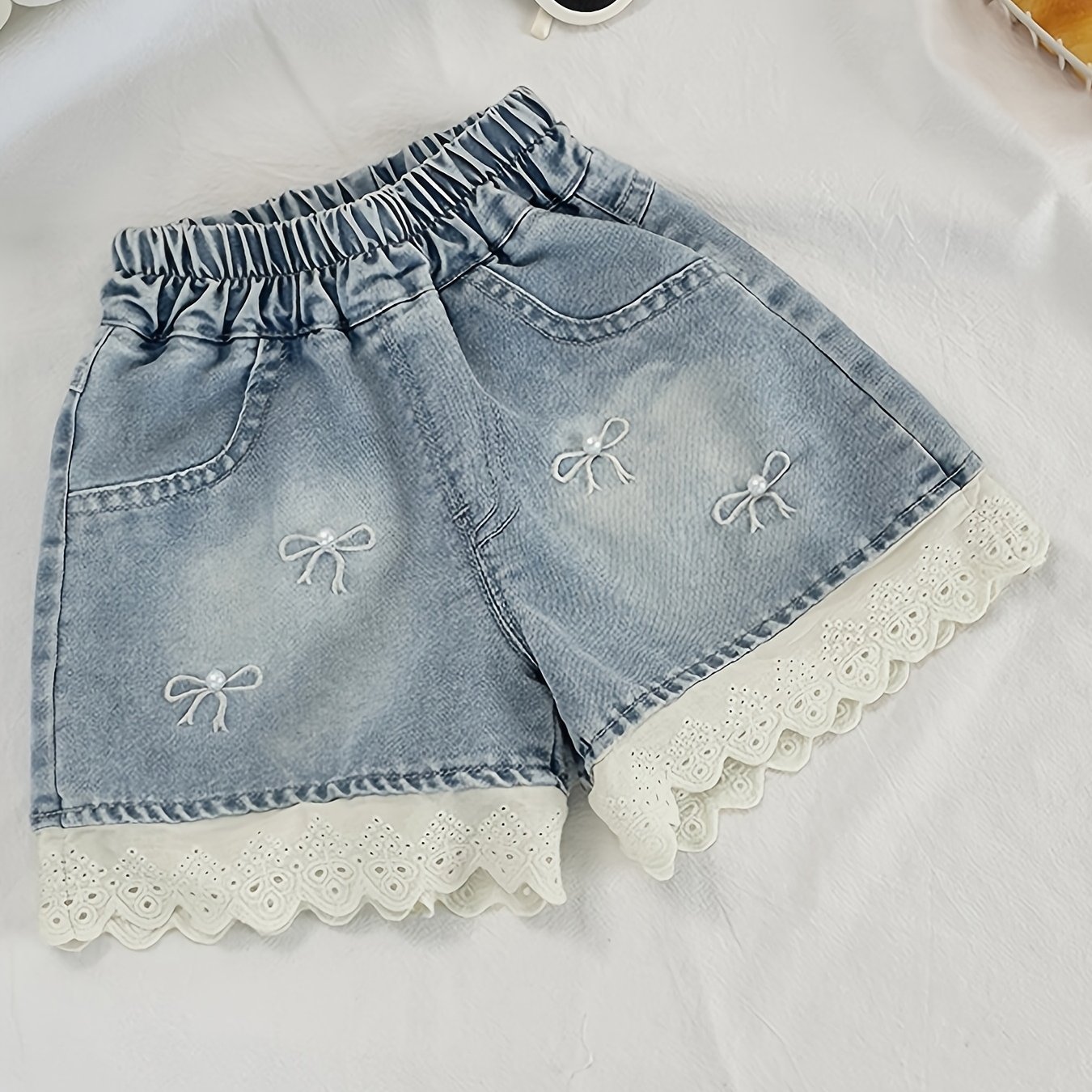 Image of Girl's Thin Denim Shorts, Summer Korean-style Pearl Bow And White Lace Ruffle Denim Shorts, Suitable For Toddlers' Casual Daily Wear, Perfect For Outdoor