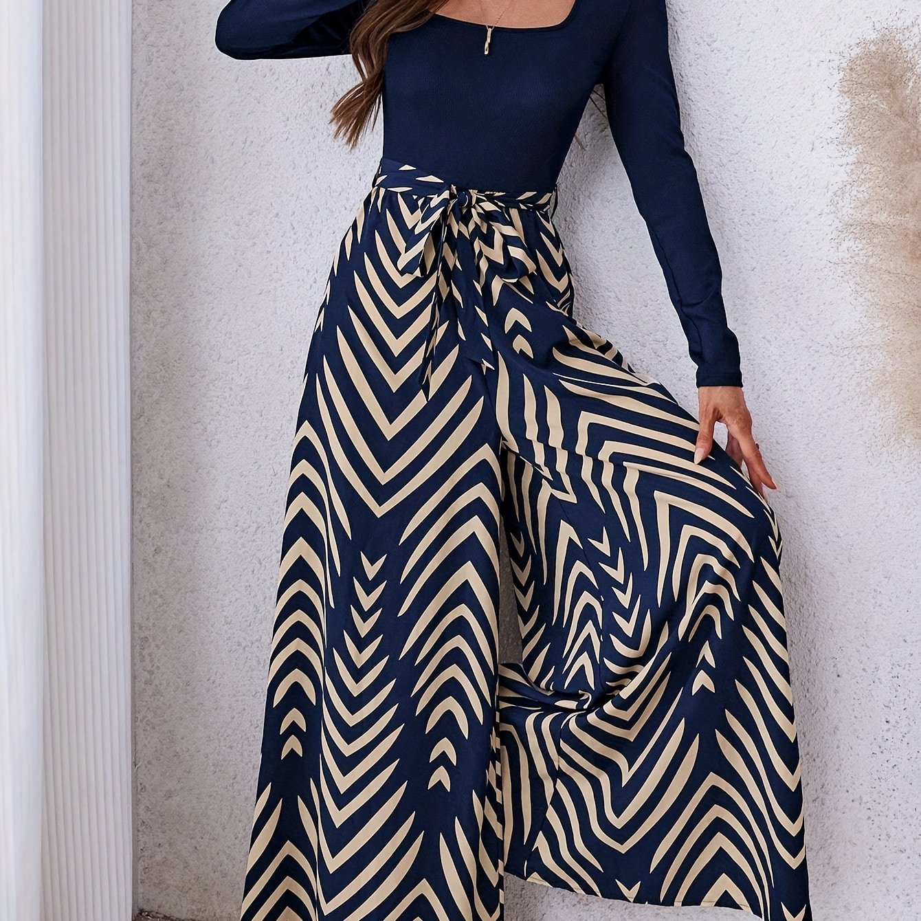 Image of Women's Elegant Solid Color Spliced Print Long Sleeve Wide Leg Jumpsuit