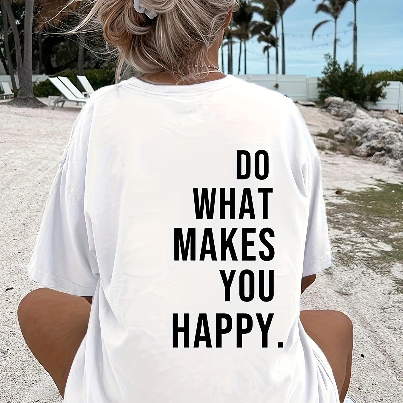 Image of T-shirt With The Slogan 'do Happy' Printed On The Back
