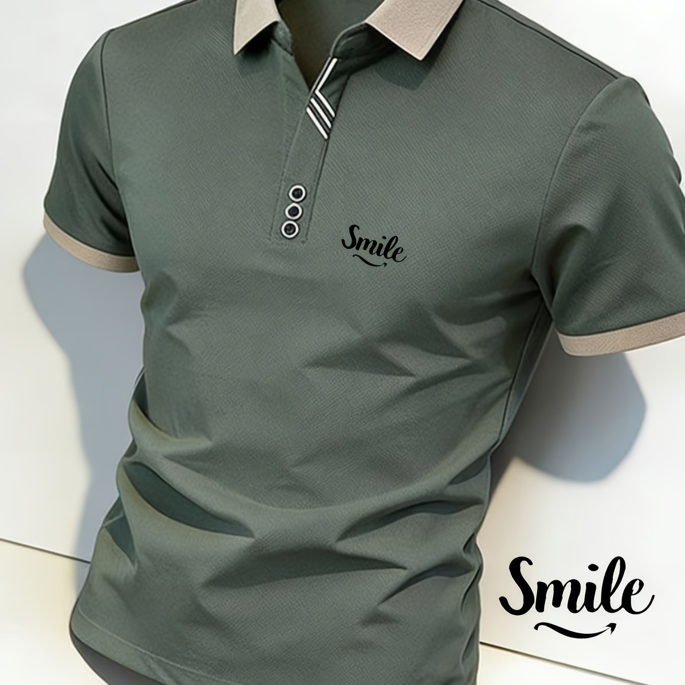 Men' -style Graphic T-shirt With "smile" Print. From Soft And Comfortable Fabric, This Menswear Top Features Collar And Mesh-like Accents On The Shoulders. An For Casual Wear