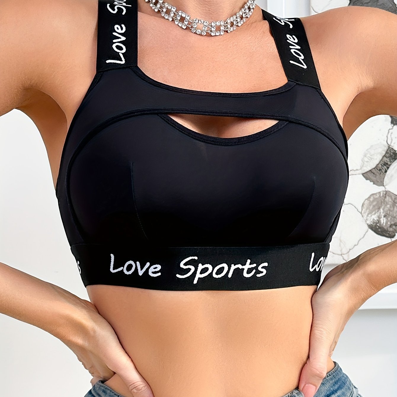 Image of Women's Black Sports Bra Without Underwire, Sexy , Thin Fabric, Comfortable And Breathable, Racerback Yoga Bra With Letter Straps
