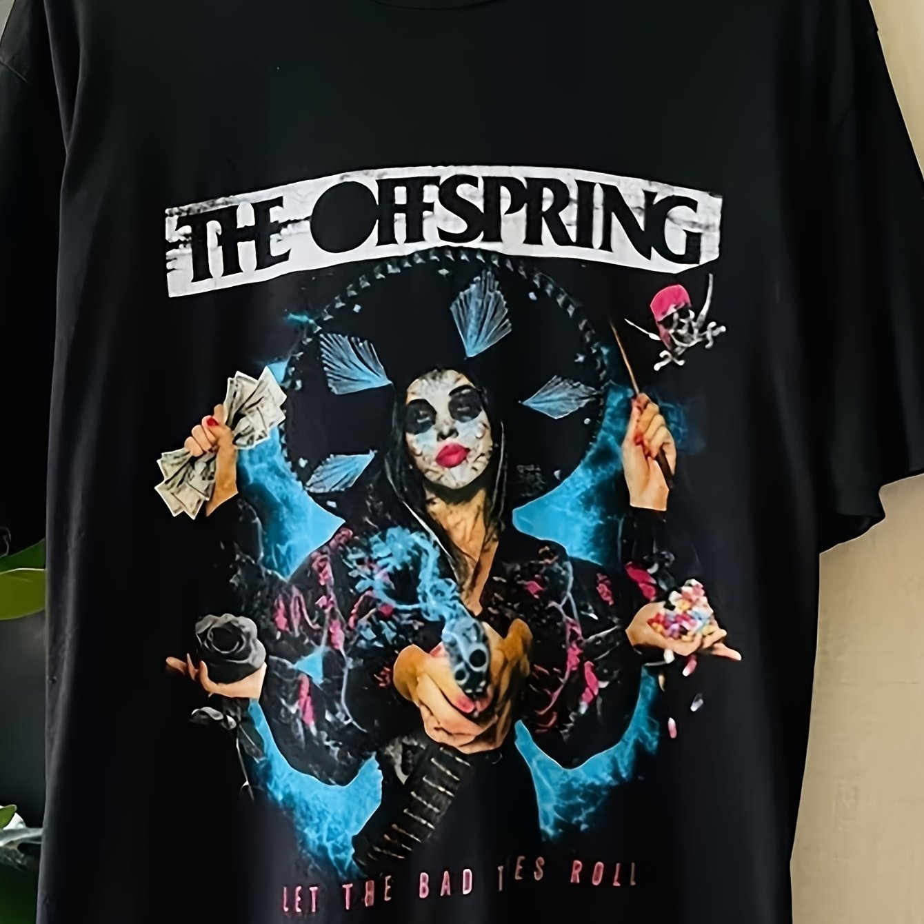 The O-ffspring Let The Bad Times Roll Graphic T-shirt In Black, A Casual Tee Featuring A Crew Neck, Loose Fit, And Short Sleeves, Ideal For Everyday Wear, Travel
