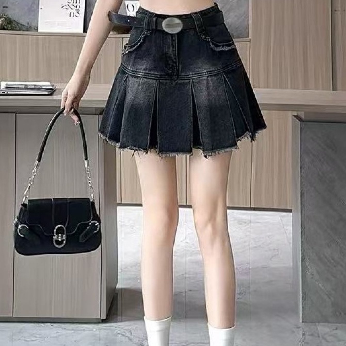 Image of Women's Denim Skirts, Including Black Options, Feature And A Mid-length Cut With A Fringed Design. Versatile And Trendy Pieces Are Made From Stretchy Denim, Perfect For Spring, Summer, And Fall