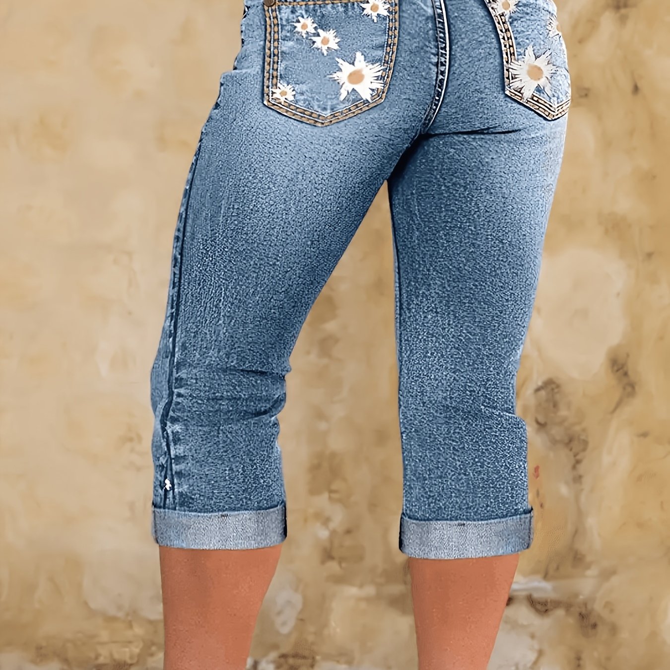 Image of Hme: Women's High-waisted Jeans, High-waisted Hip-raising Denim Capri Pants, With Pleated Design On The Back Pocket And Embroidered Daisy Pattern, Women's Denim Capri Pants