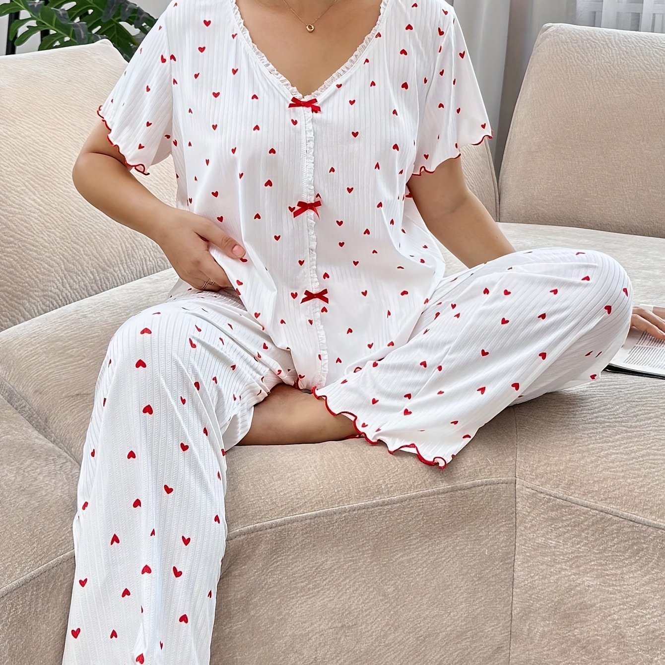 Image of Comfortable Fabric Loungewear With Heart Print, Rolled Cuffs, V-neck, Short Sleeves, And Long Pants, Suitable For Outdoor Wear