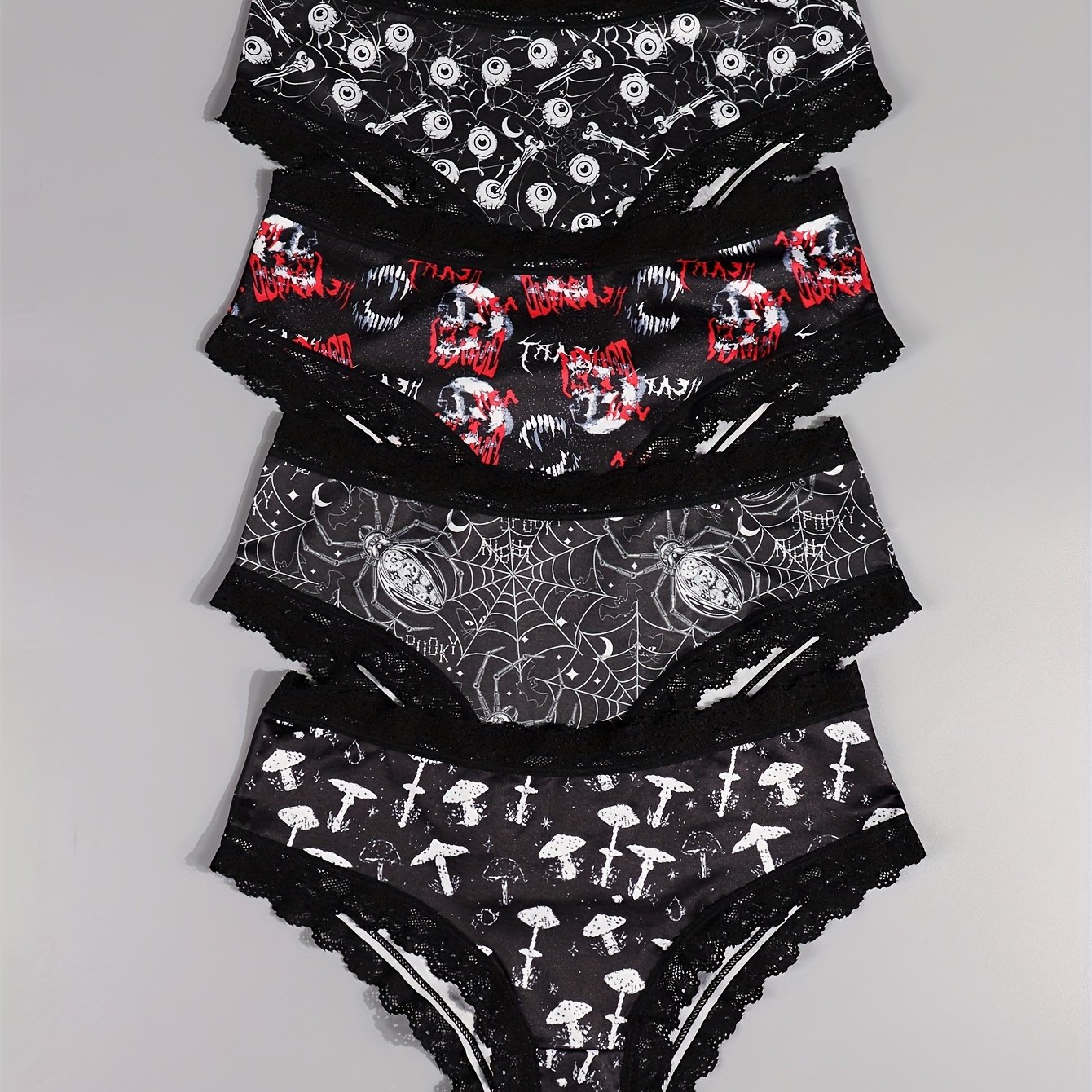 E-shop Set mit 4 Gothic-Hipster-Slips für Damen im Gothic-Stil mit einem Halloween-Druck mit Totenschädeln, Augen, Sternen, Pilzen und Insekten,