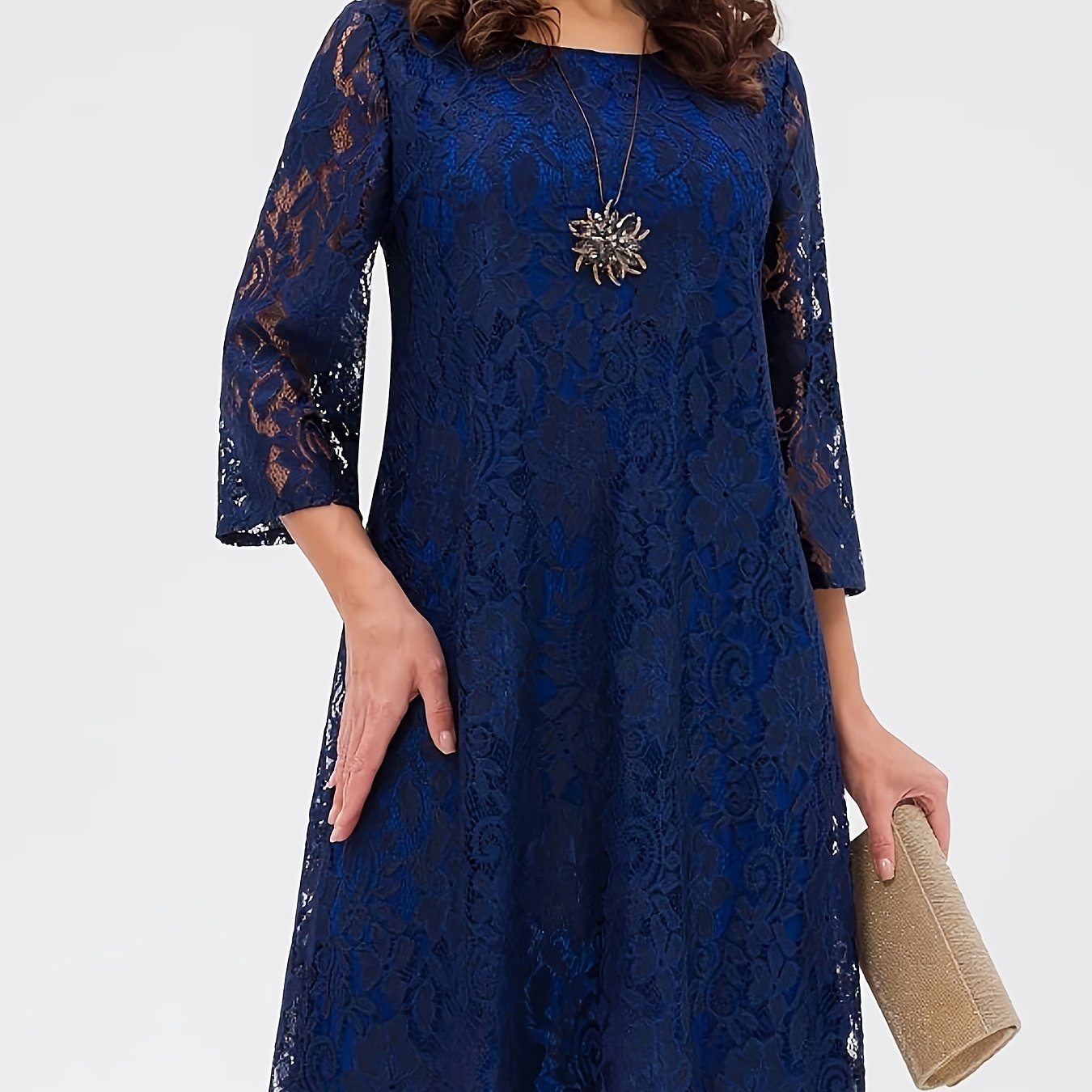 New Lace Dress With Intricate Cut-out Detailing, Round Neckline, Three-quarter Sleeves, And A Fashionable Mid-length Design