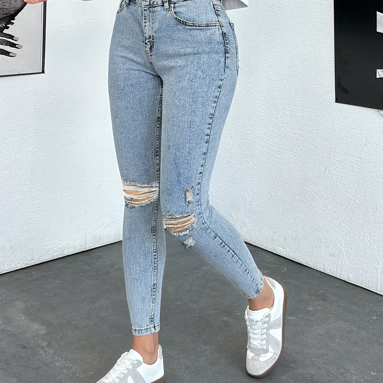 Image of Ripped Women's Jeans With Small Feet