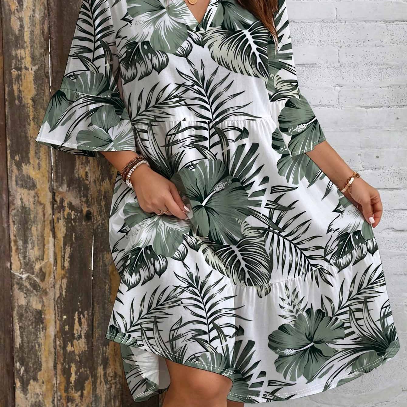 Image of Plus Size, Plus Size Print Dress For Women. Vnotch Neck. Bell Sleeves. Layered Skirt. Loose Fit. Elegant Bohemian And Vintage Vacation Summer Dress With Green Plant Leaf Patterns.