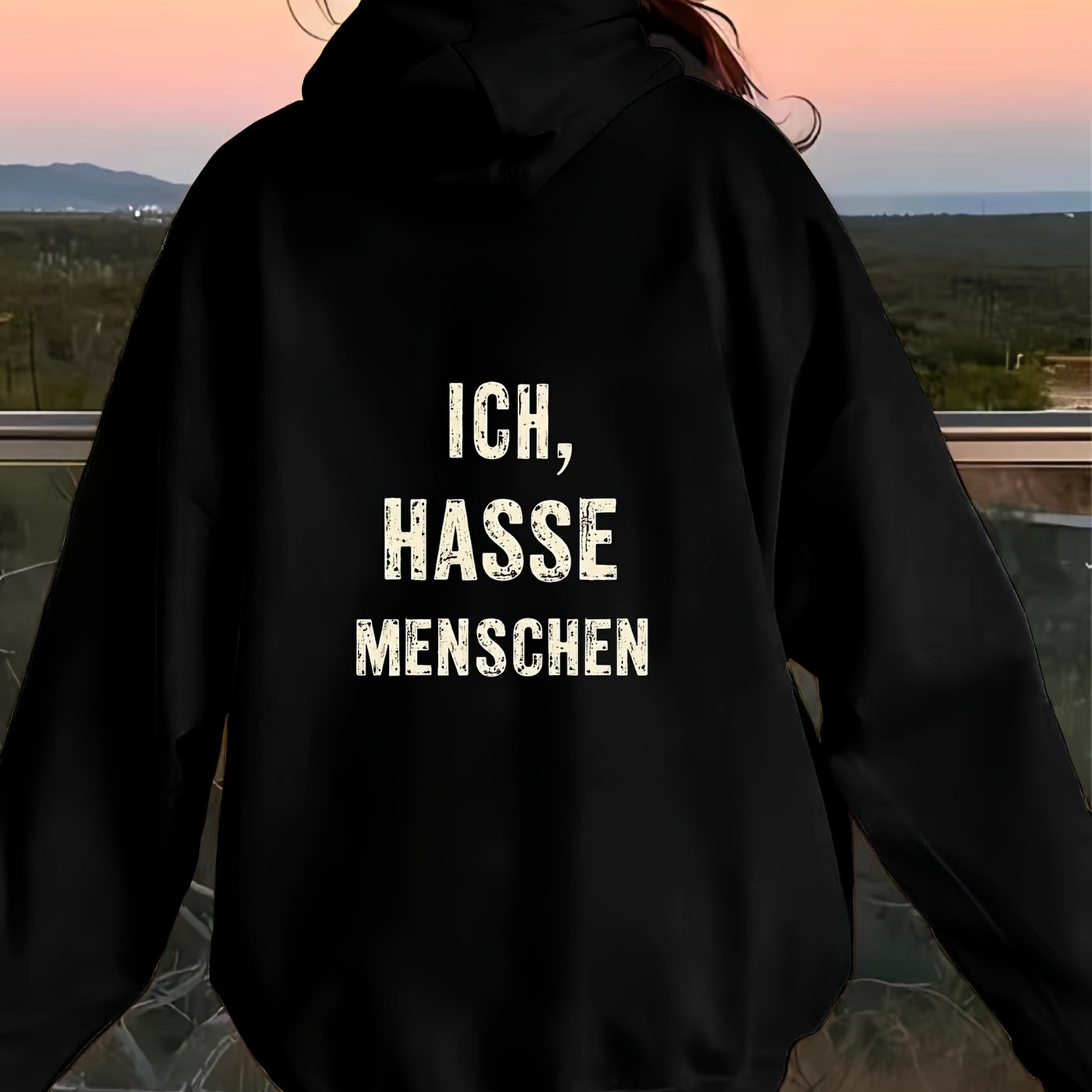 Black Hoodie In Text Style With The German "ich Menschen" Printed On The Back.