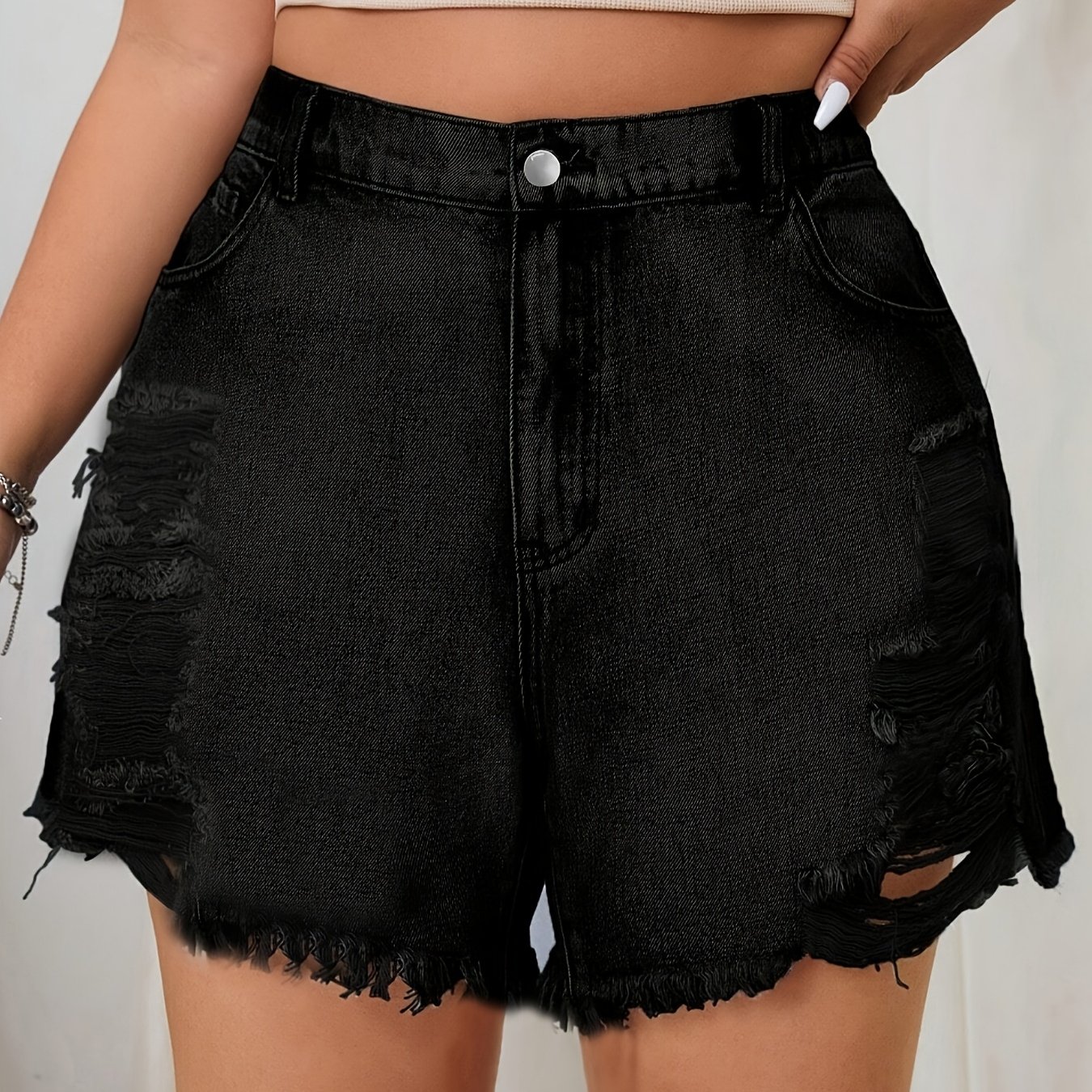 Image of Women's Sexy Ripped Denim Shorts With Curved Hem, High-waist Hip-covering A-line Wide-leg Hot Pants For Spring, Summer, And Fall