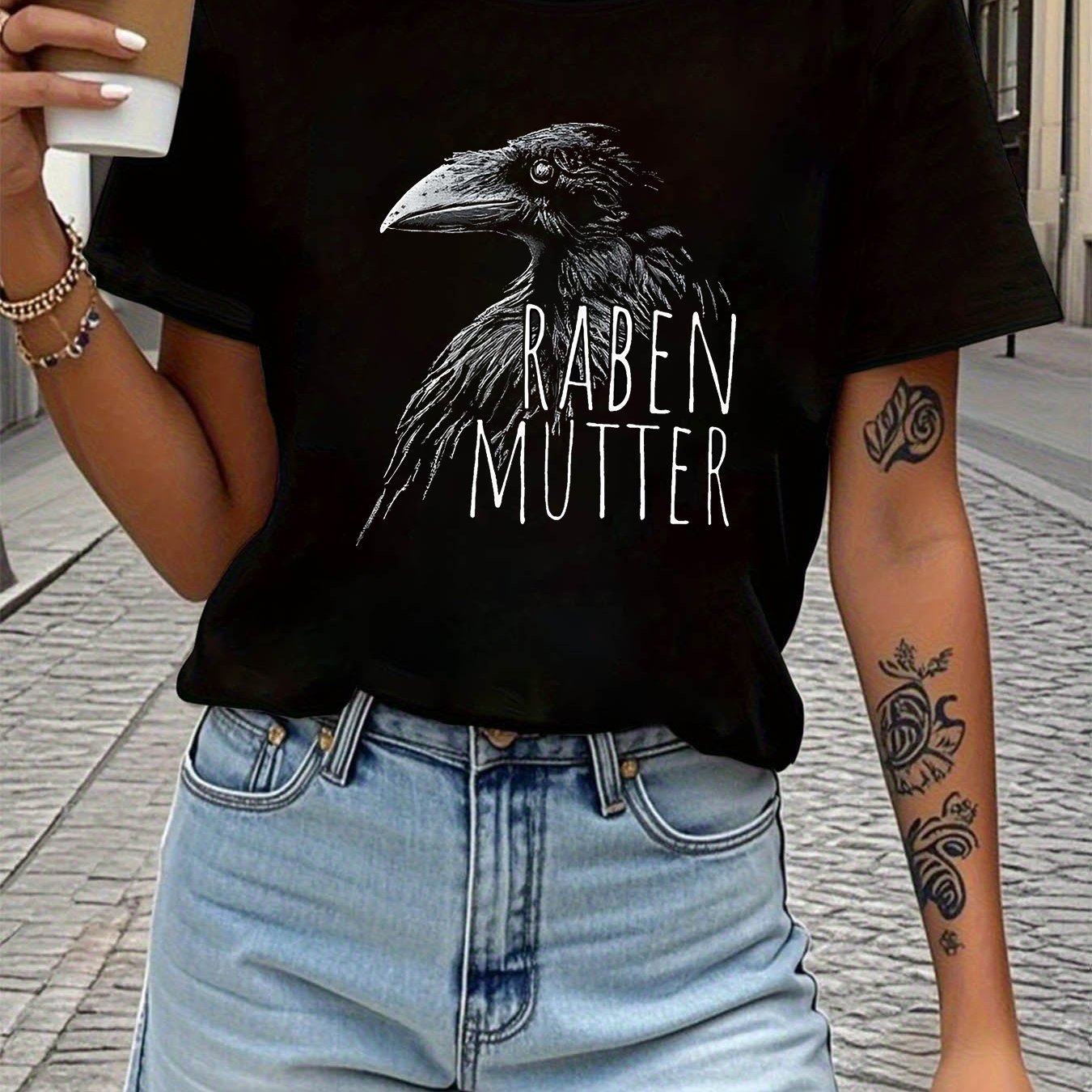 A Women's Round-neck Spring And Summer T-shirt Featuring A Realistic Of A Crow With The Text ' Mutter'