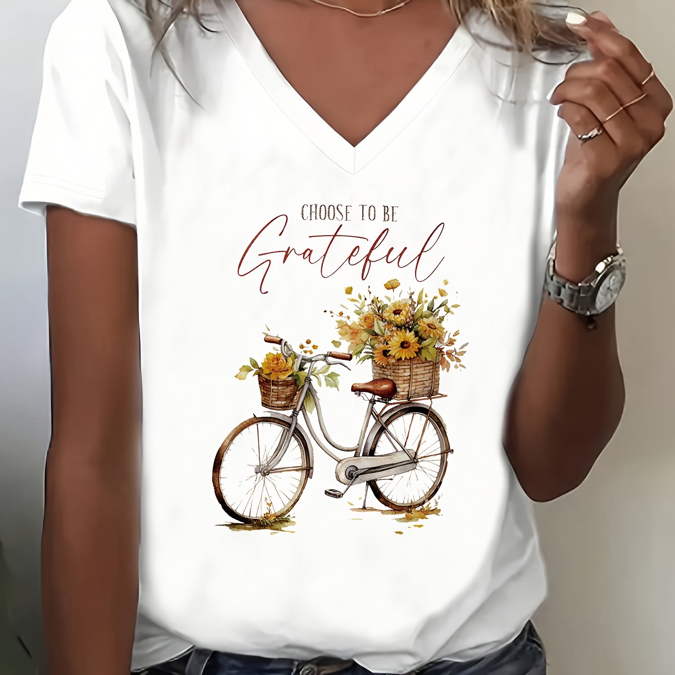 Image of Women's T-shirt With A Floral Bicycle Design - Soft, Slightly Stretchy Short-sleeve V-neck Casual Top For Spring And Summer