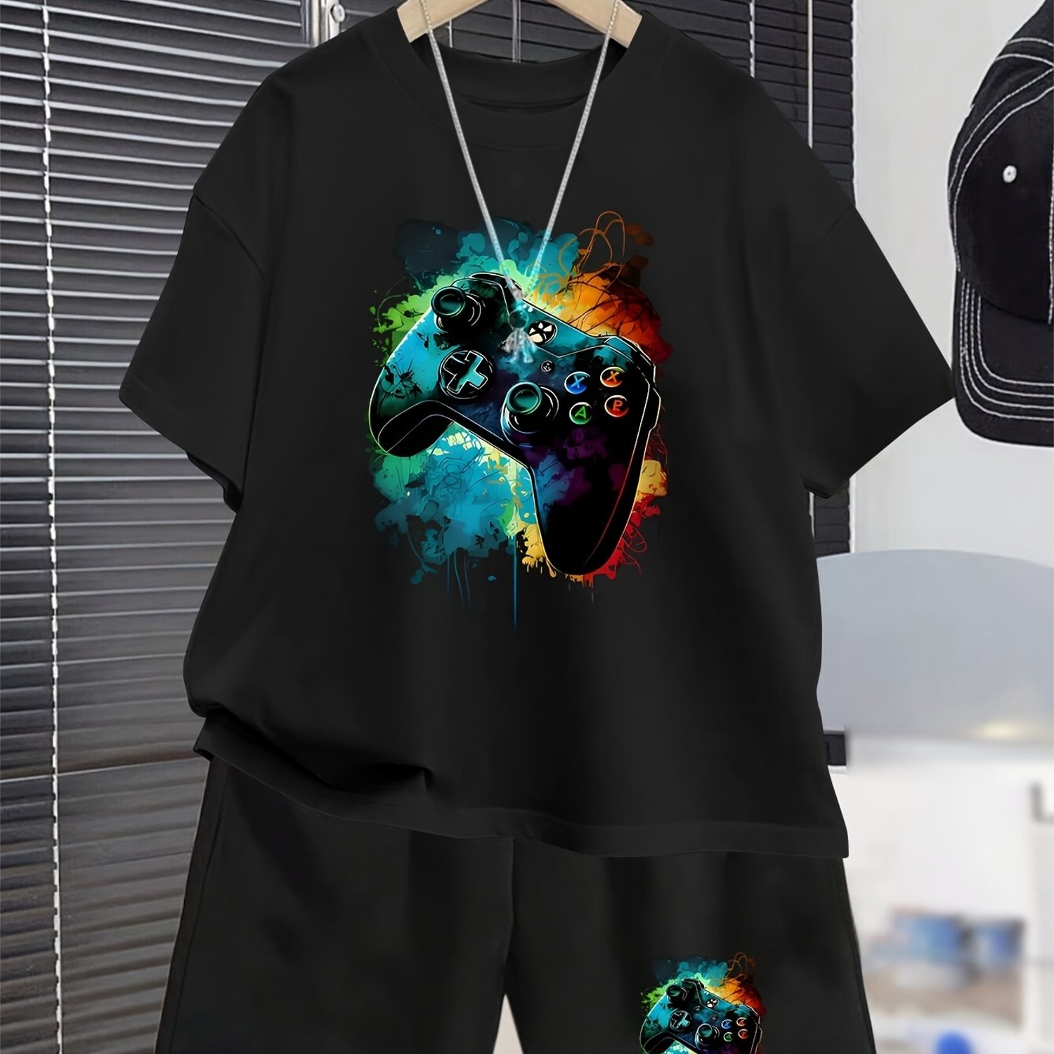 Image of Vibrant Patterned Summer Outfit For Boys Featuring A Short-sleeve T-shirt And Shorts, Perfect For Outdoor Sports