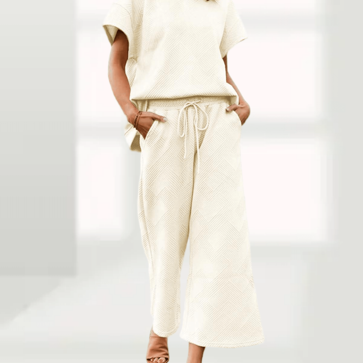 Image of Casual Loungewear Sets For Women Featuring A Two-piece Outfit With Short-sleeve Tops And Drawstring Waist Cropped Wide-leg Pants