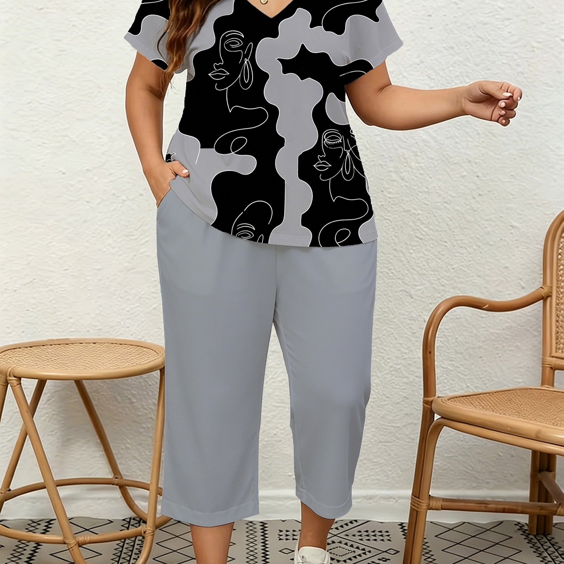 Image of Plus Size, Plate-size Suit - An Elegant And Fashionable 2pcs V-neck For Women. It Features An Abstract Face Print T-shirt And Pocket 7-inch Pants, Making It Suitable For Daily , , And Vacations.