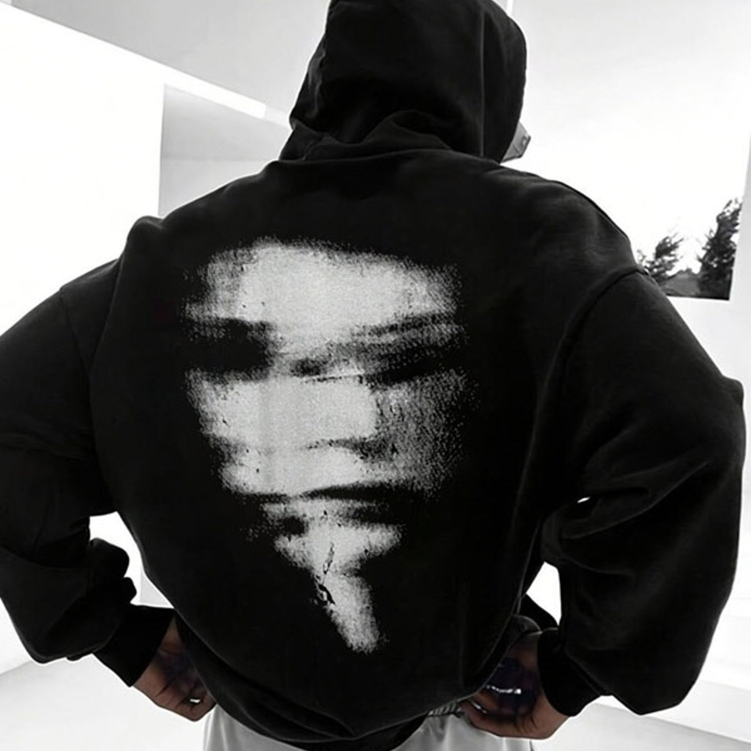 Image of Artistic White Face Graphic Black Pullover Hoodie, Comfortable Polyester Long Sleeve Drawstring Hooded Top, Multiple Sizes , Ideal For Casual Daily Wear And Outdoor Activities