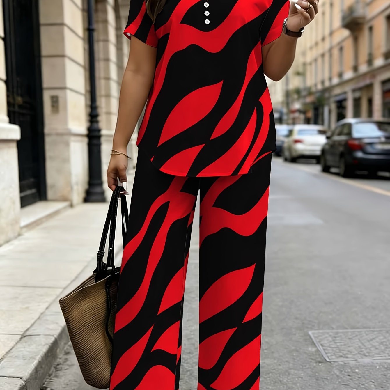 Image of Women's Fashion 2pcs Set, Red And Black Abstract V-neck + Fake Button Short-sleeved Top With Wide-leg Pants, Suitable For Daily And Casual .