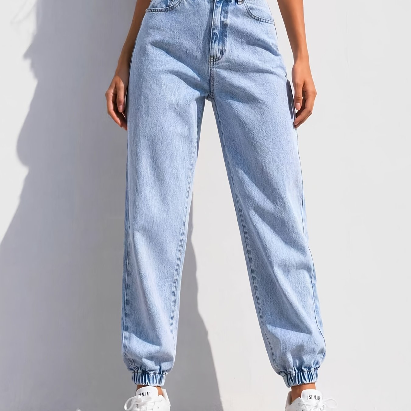 Image of Women's Slim Straight-leg Jeans In Classic Acid Wash. High-waisted Pants Feature Tummy Control For , With Functional Pockets And A Versatile Street-. Ideal For Work, Travel, And The Office.