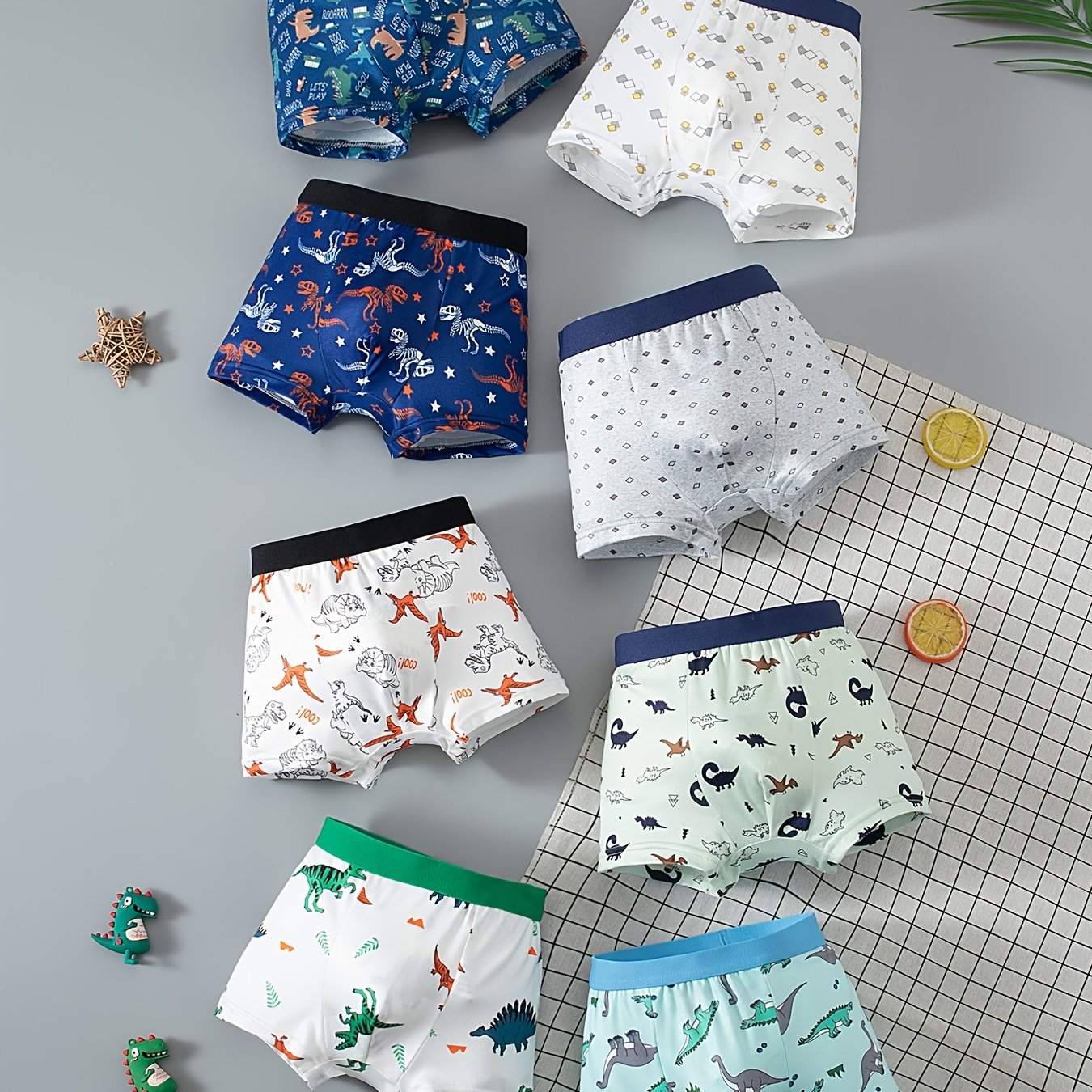 E-shop Eine Packung mit 8 Boxershorts mit stylischen, farbenfrohen Dinosaurier-Prints für Jungen im Alter von 4-12 Jahren, geeignet für alle