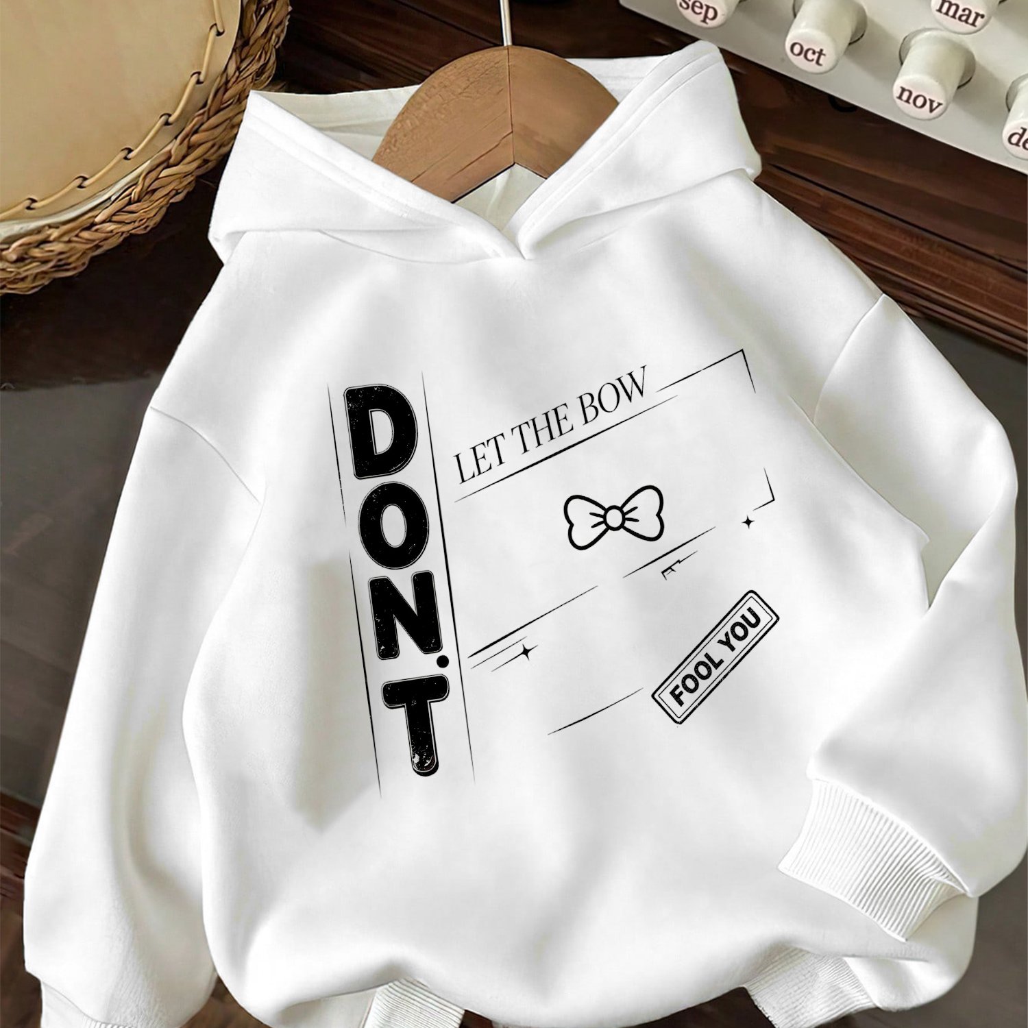 Image of Fall Winter Stylish Girls' Long-sleeve Hoodie, 'minimalist Bow English Slogan' Print Loose- Casual Top.