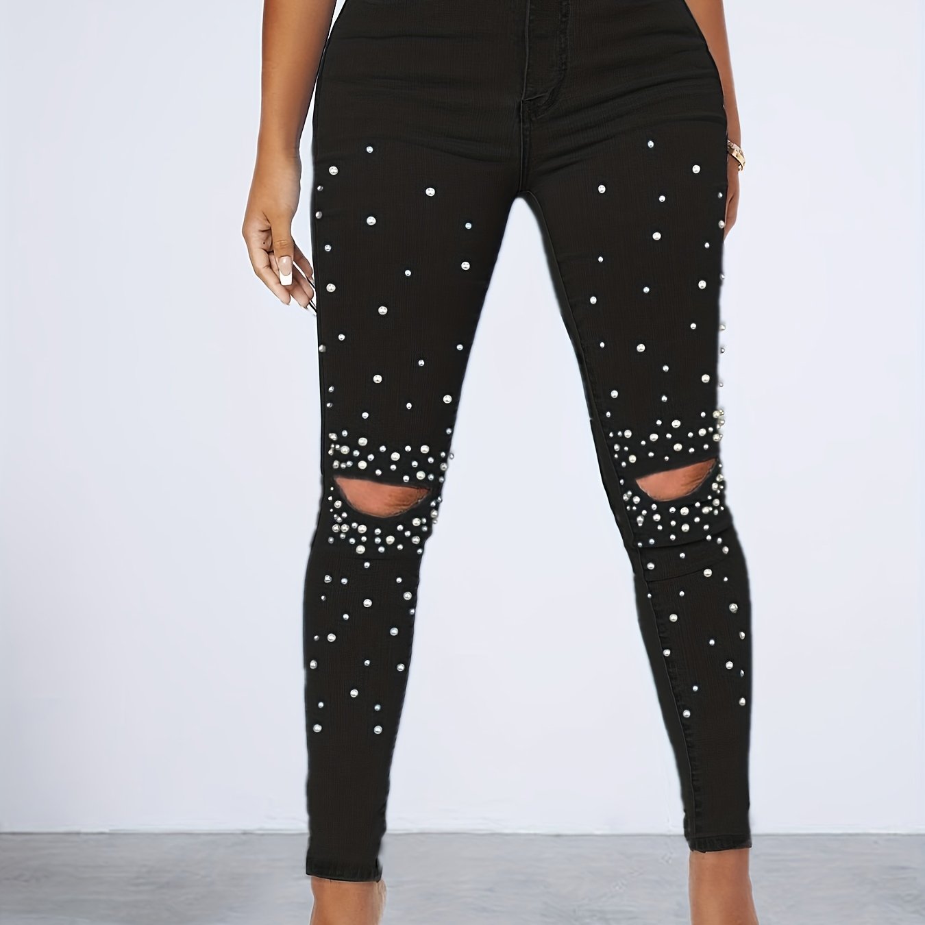 Black studded skinny sales jeans