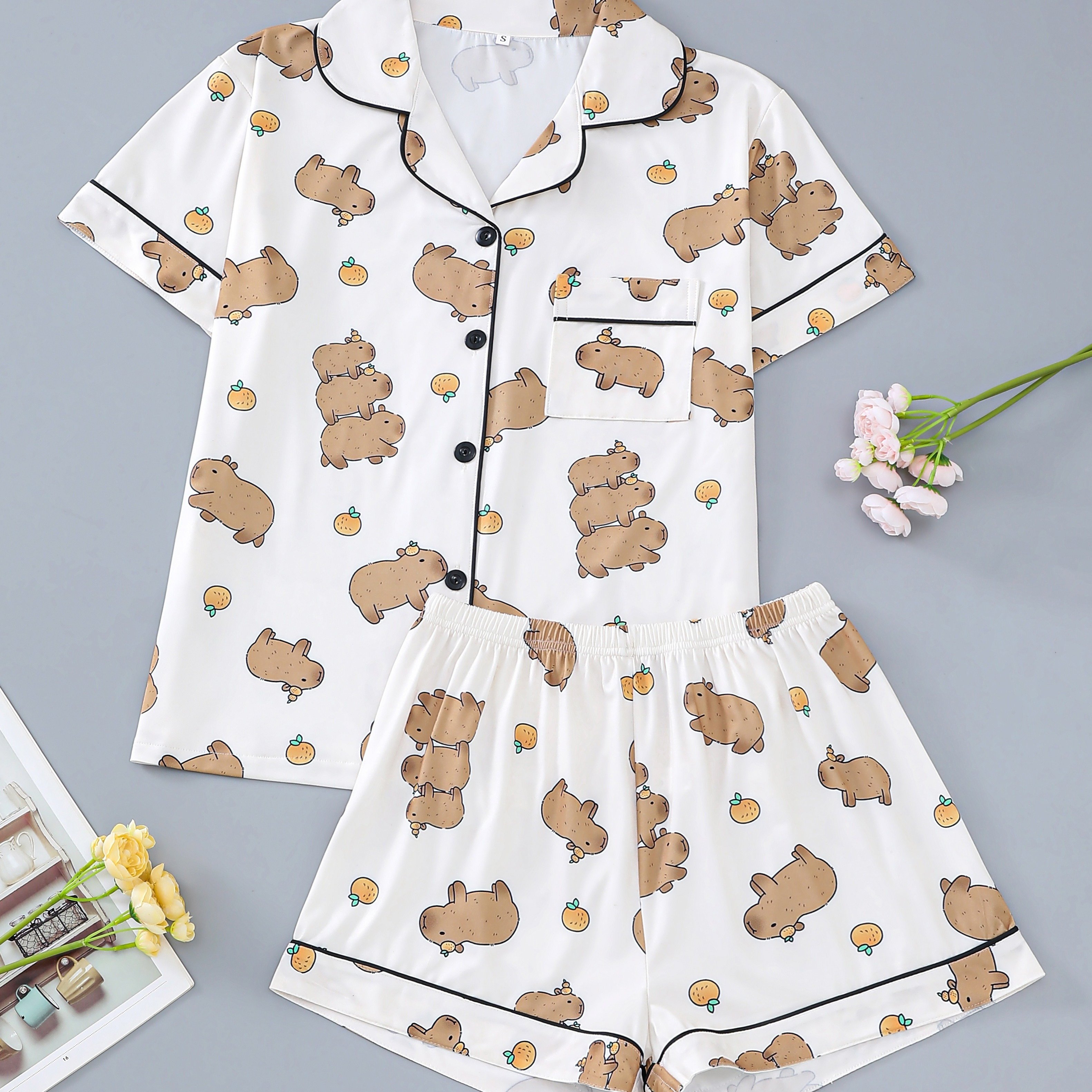 Image of 2pcs Women's Pajama Set, Cute Capybara Print, Short Sleeve Button-up Shirt And Loose Elastic Shorts, Fashionable Casual Wear