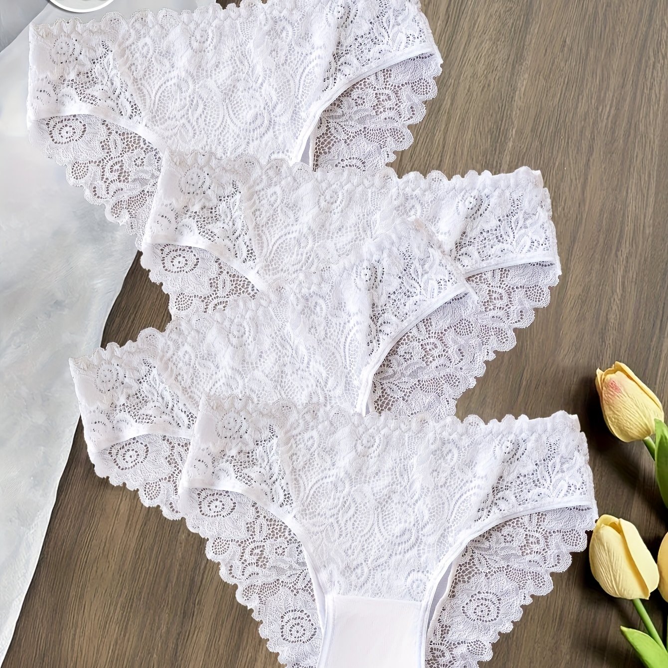 Image of Set Of 4 Women's Panties In Solid Colors Featuring Lace Trim And Floral Designs - Soft, Breathable, And Comfortable