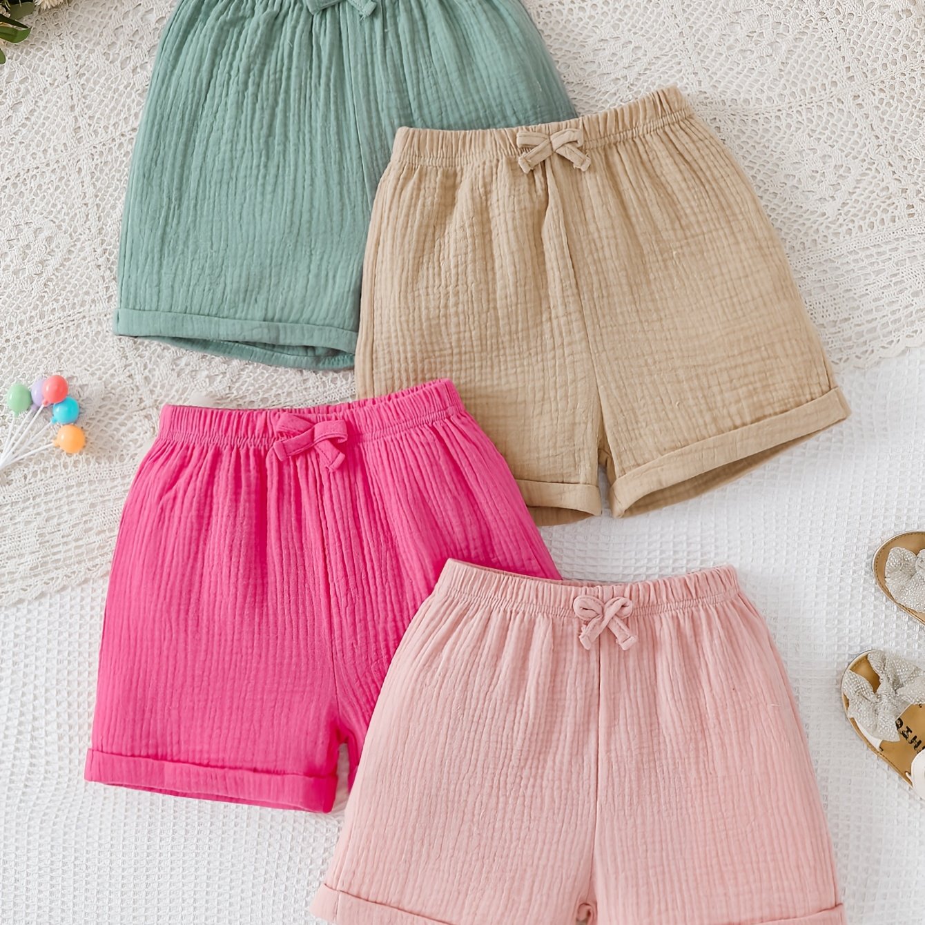 Image of Girls' Fashion Spring/summer New Arrival Crinkle Fabric Shorts With Three-dimensional Bow Decoration And Rolled , Set Of Four, Perfect For Outdoor