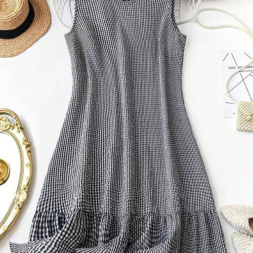 chic black and white womens sleeveless midi dress round neck ruffle hem suitable for spring summer