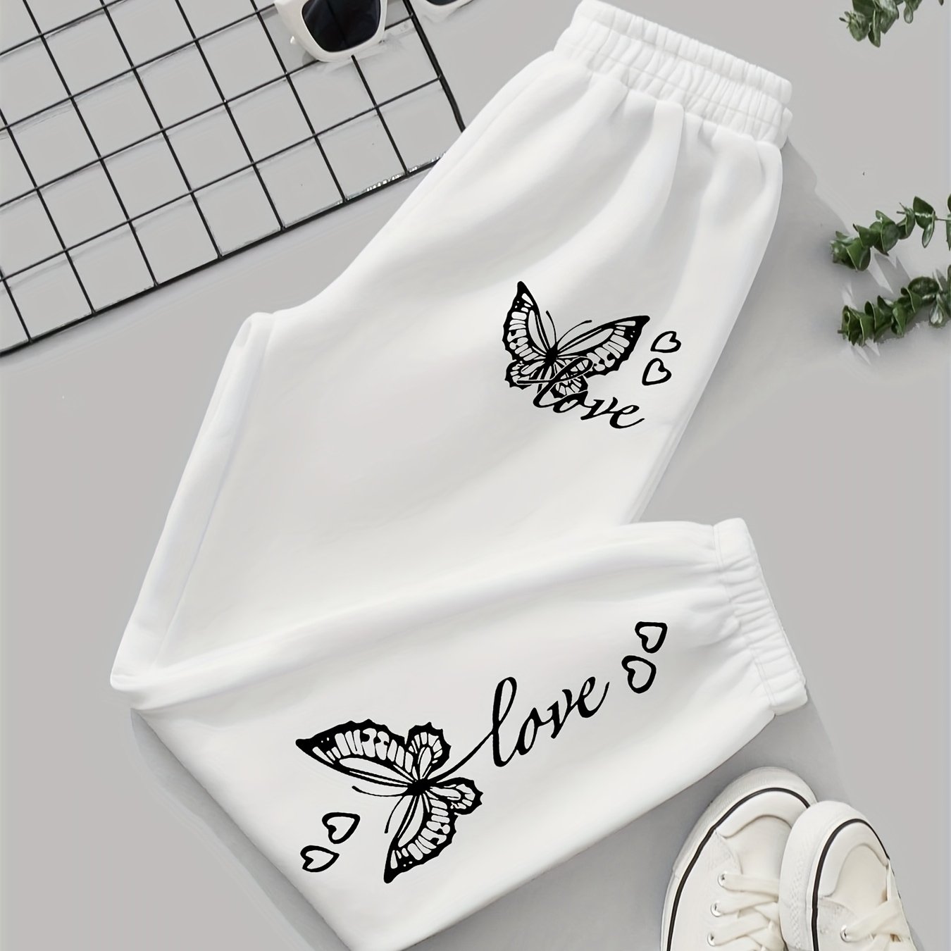 TEMU 1 pantalon de jogging décontracté pour femme en polyester avec imprimé papillon, tissu tricoté toutes , détail de poche, pantalon de sport pour