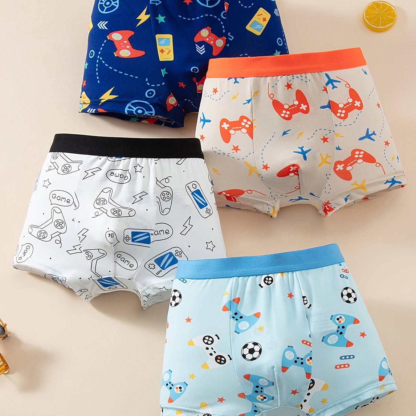 TEMU 4pcs Set Of Boys' Underpants, Spring/autumn Mid-size Boys' Same Style Colored Game Console Soccer Pattern Boxer Briefs Style Thin Style Cartoon