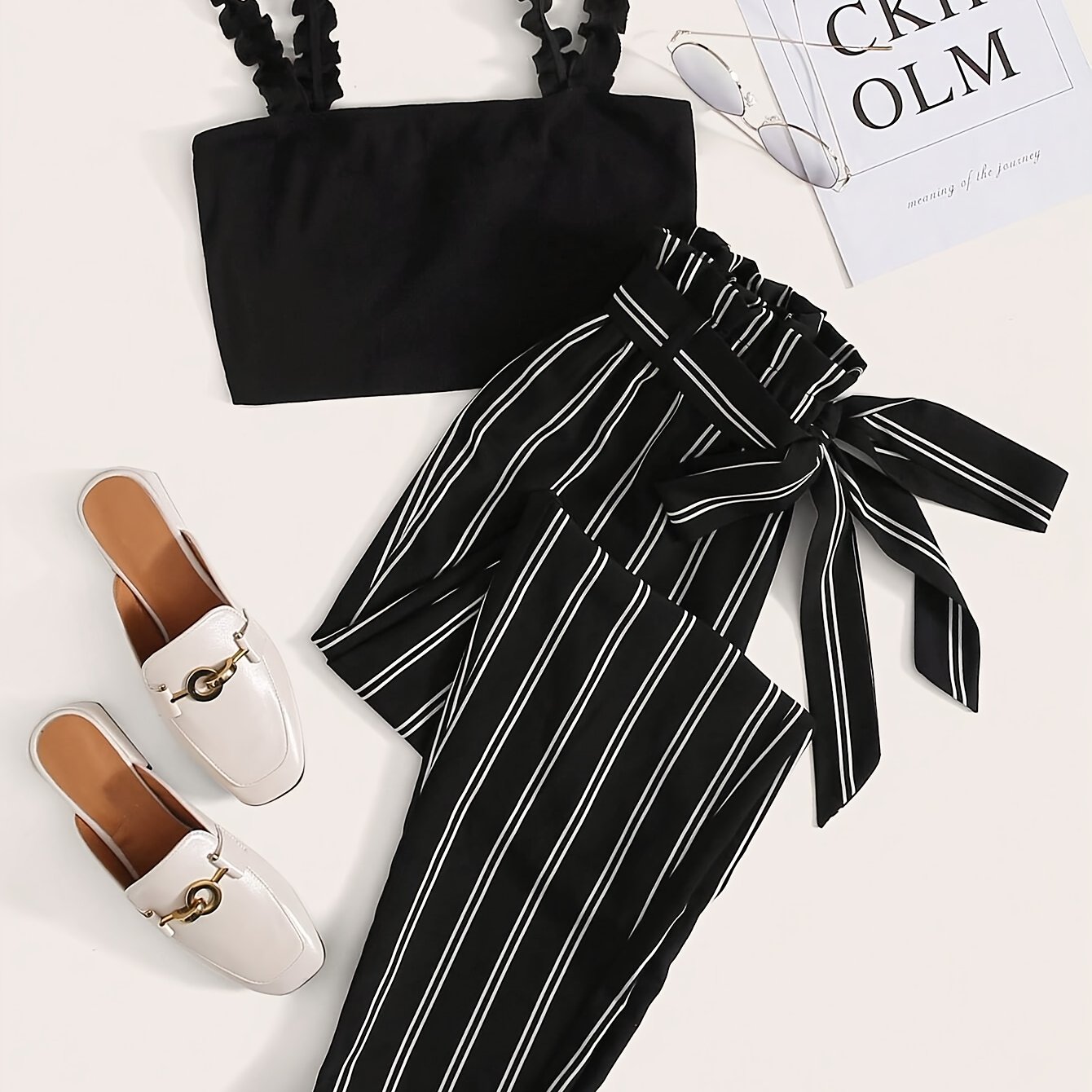Image of Fashionable And Elegant Women's Casual Top With Straps And A Bandeau Design, With Striped Pants For A Summer Outfit And Summer