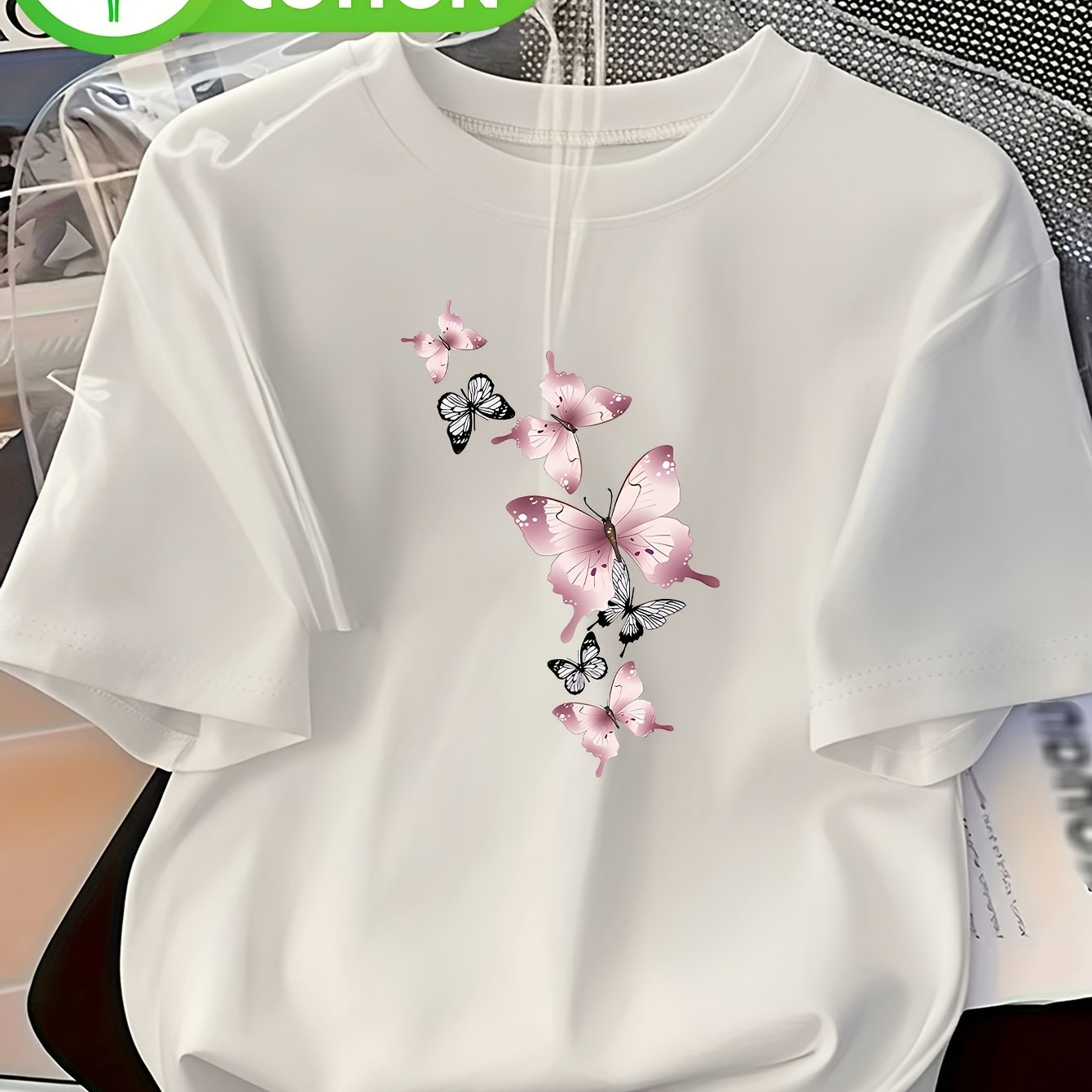 Image of Plus Size, Women's Plus Size Top, Printed Casual Top With Round Neckline, Short Sleeves, Black Wings
