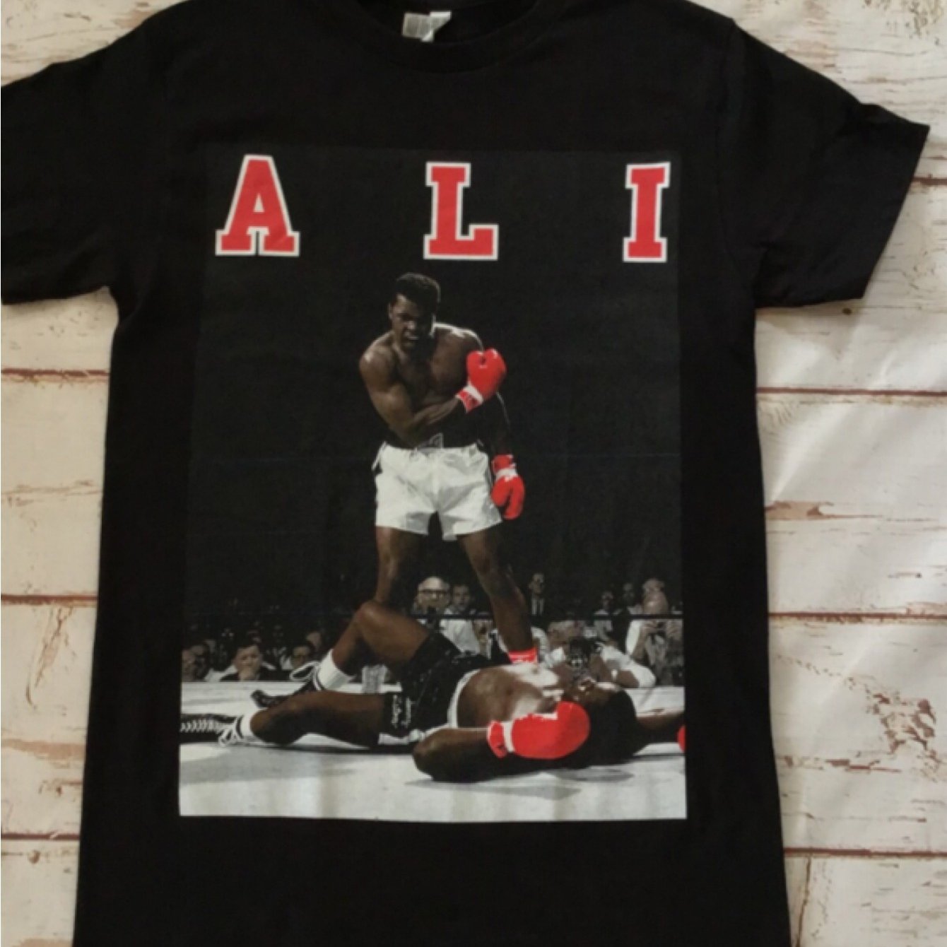 Image of Men's T-shirt Featuring A 3d Print Of A Vintage Boxing Design With Red Ali Lettering | Black Crew Neck Tee, Perfect For Casual And Sports Enthusiasts, 100% Fabric, 180g, Short Sleeve, Medium Stretch