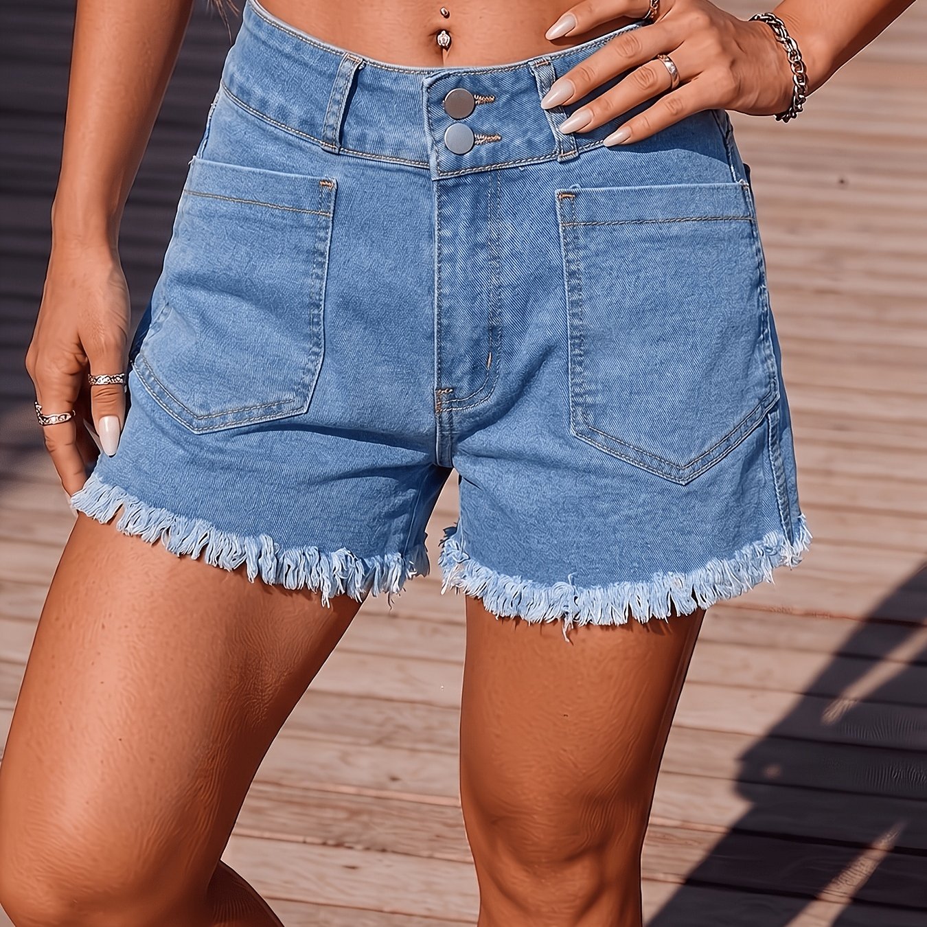 Image of Women's High-waist Double Button Denim Shorts, Light Wash Blue, Frayed Hem, Slant Pockets, Stretch, Vintage Style, Machine Washable, Jean Shorts