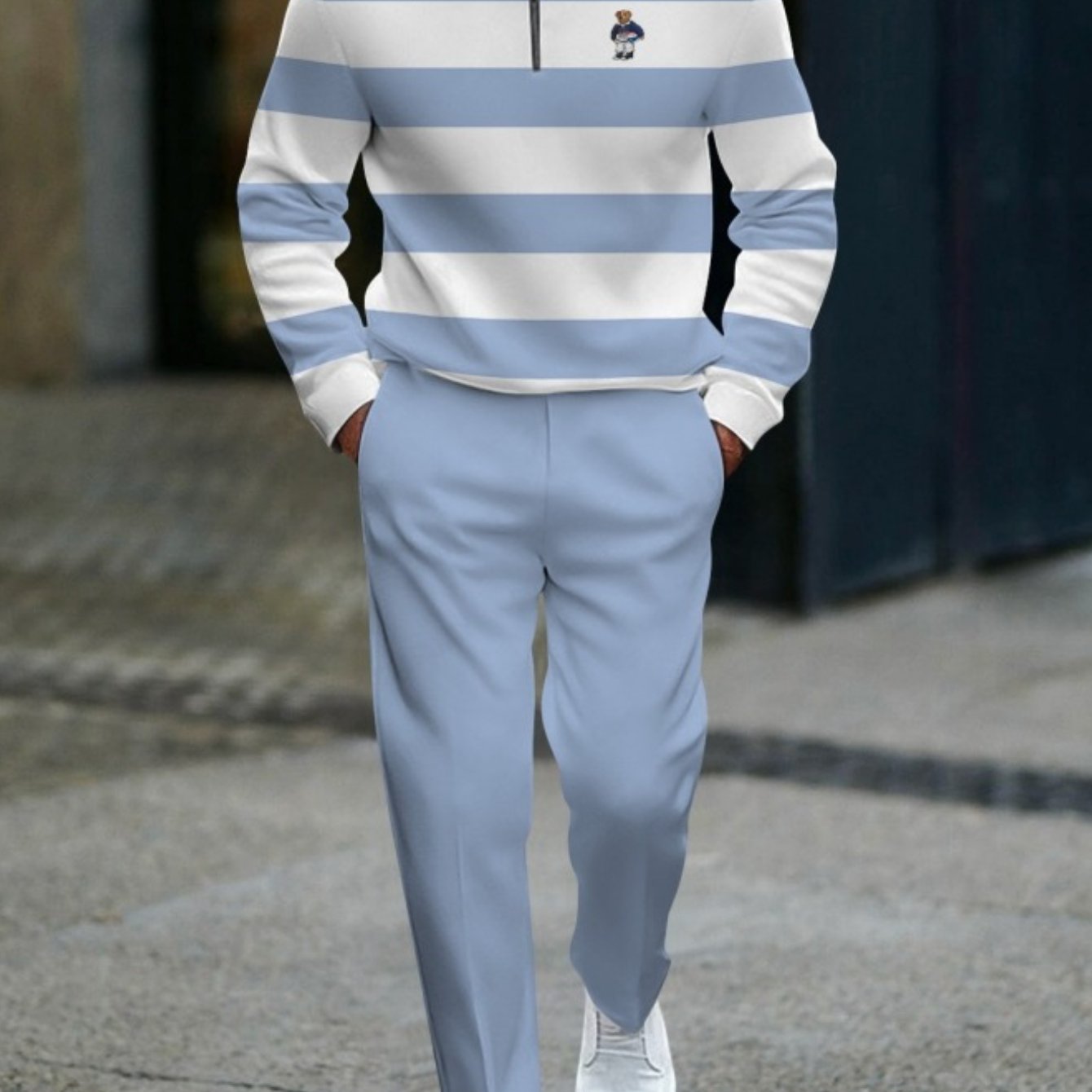Image of Light Blue And White Striped Two-piece Outfit For Men, Featuring A Half-zip Pullover Sweatshirt With Cartoon Bear And Elastic Waist Straight-leg Pants, Perfect For Style