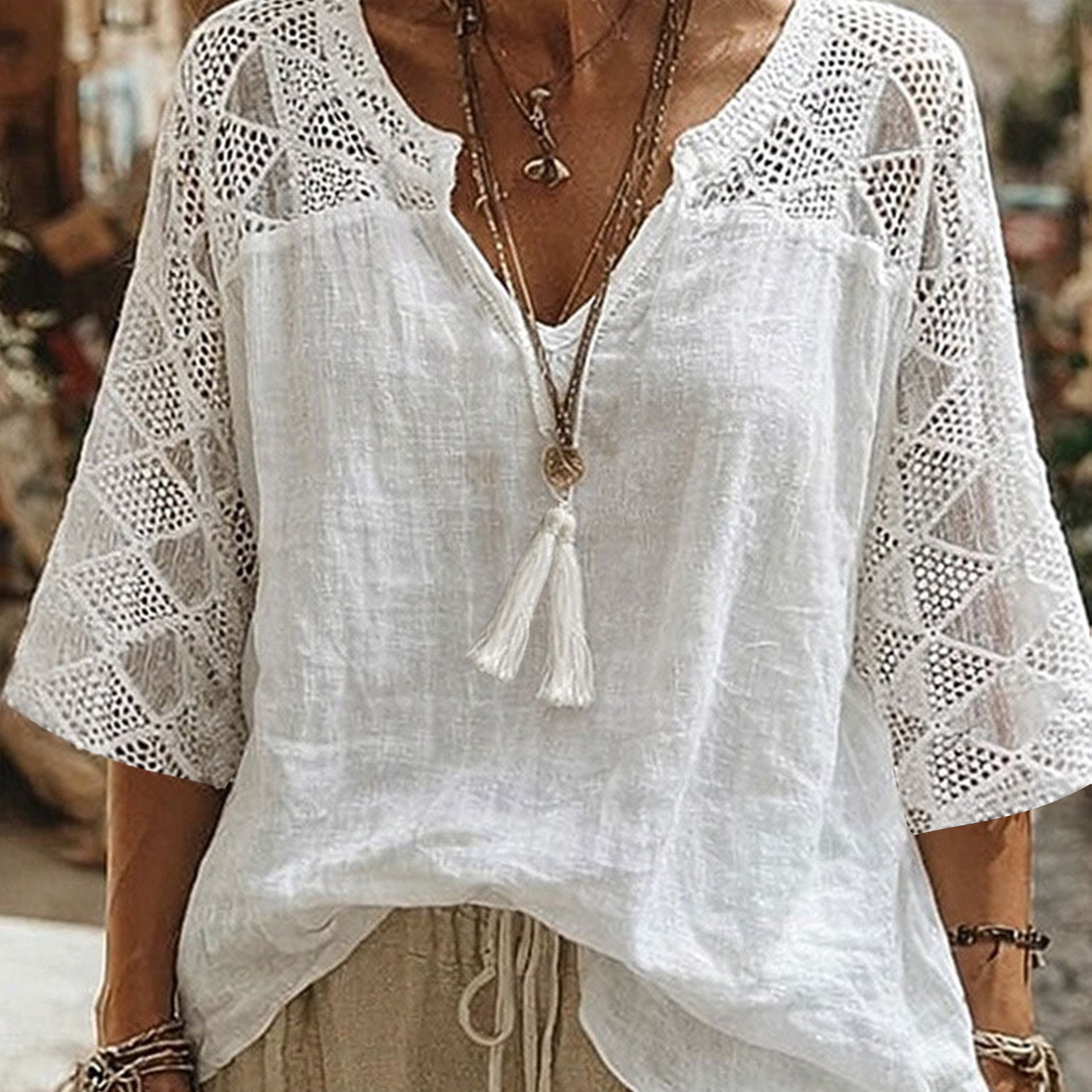 Image of Fashion Women's Elegant V-neck Cutout Lace Three-quarter Sleeve Shirt Solid Color Tassel Tie Loose Comfortable Bohemian Vacation Top