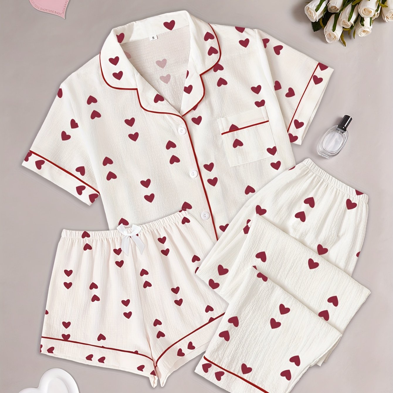 Three-piece Pajama Set With Bubble Ruffles, Heart Prints, And A Bow, Including Short Sleeves, Shorts, And Long Pants