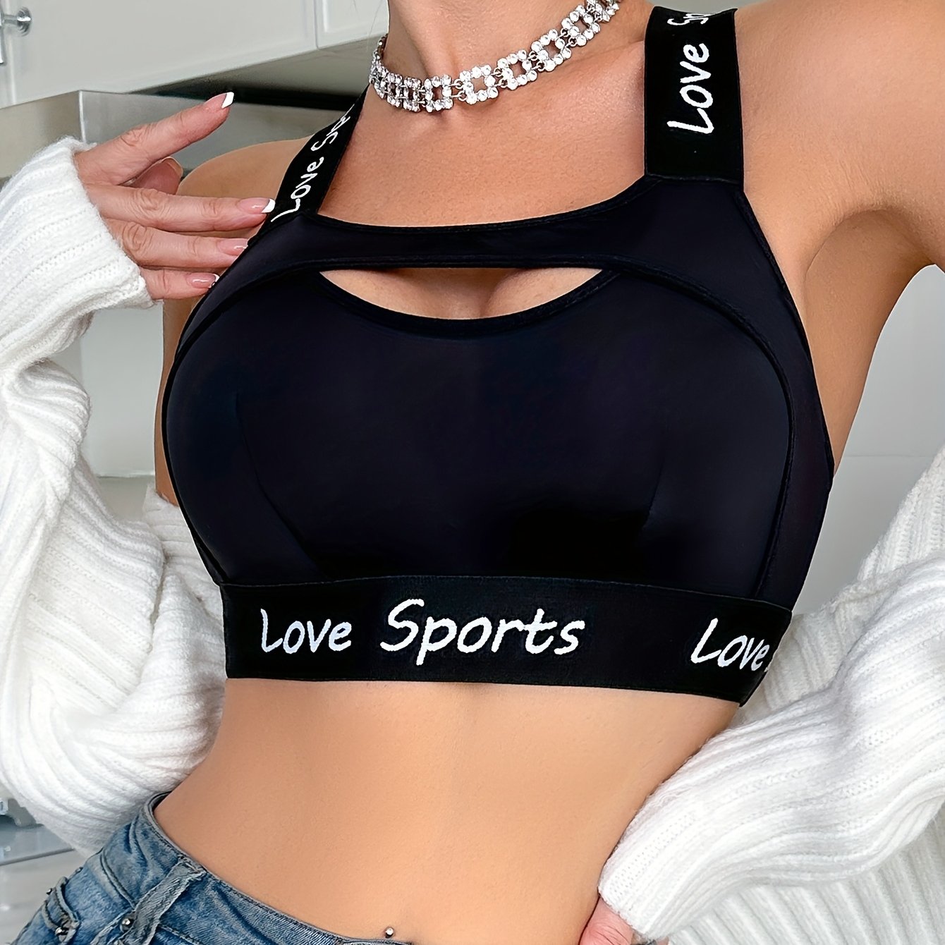 Image of Women's Black Sports Bra - Wireless, Breathable Yoga Bra With "" Lettering, High-elasticity Racerback Design For & Support During Workouts, Workout Support | Sporty Chic | Highelasticity Fabric