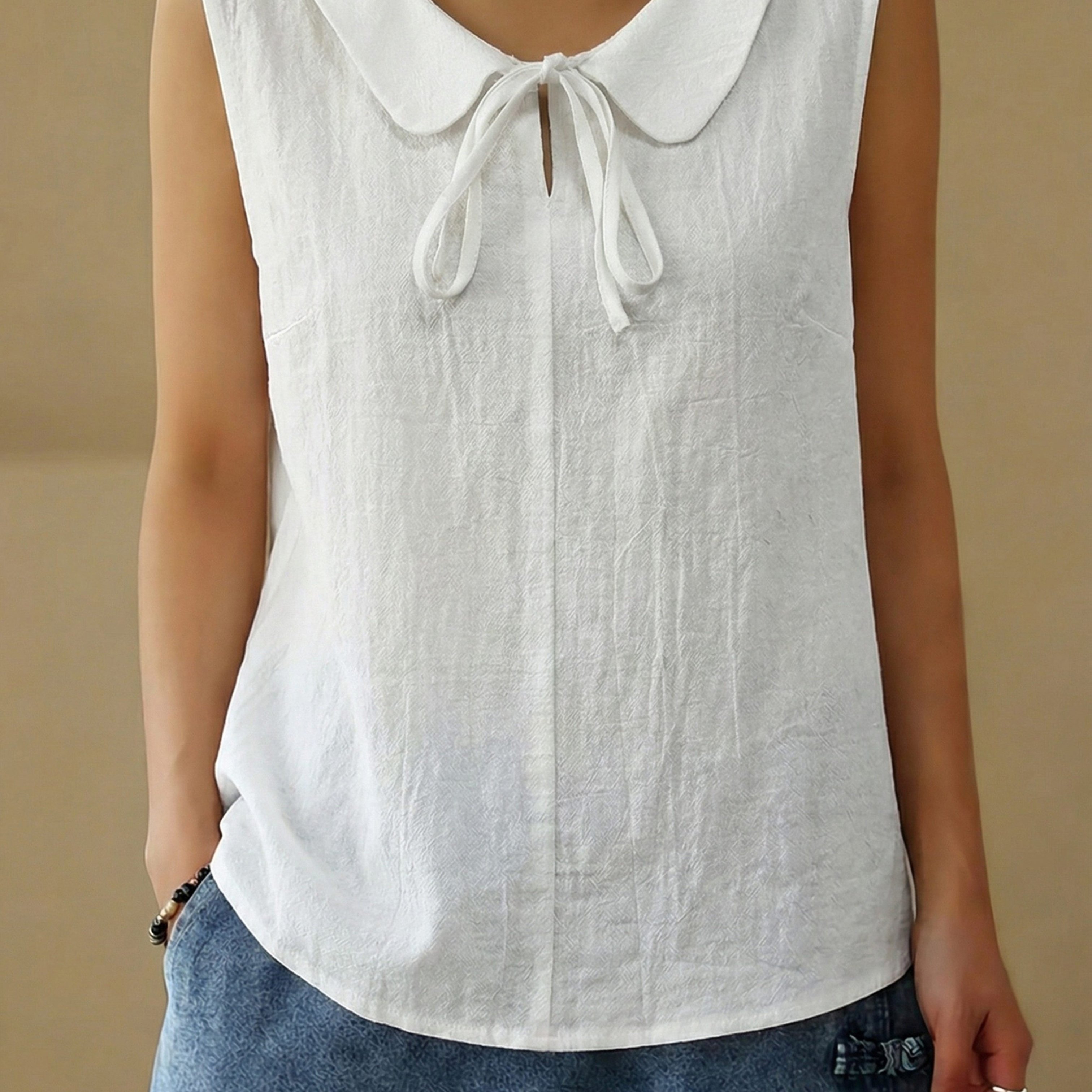 Image of Solid Color Doll Collar Loose Sleeveless Casual Shirt For Women, Versatile For Daily And Outdoor Leisure, Button Decoration Neckline With Tie Straps, Solid Color Loose Top