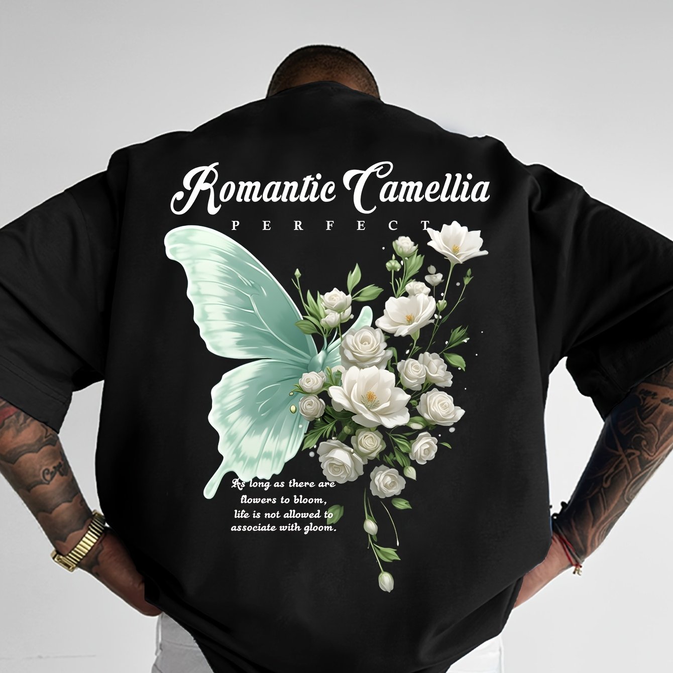 TEMU 【商品名】英字の蝶とカメリアの花のプリントが特徴的なトレンドのレディースカジュアルTシャツ。夏にのクールで快適、ルーズフィットな、カジュアルなアウトドアに最適なで万能なアイテムです。半袖トップスはファッショナブルでF。