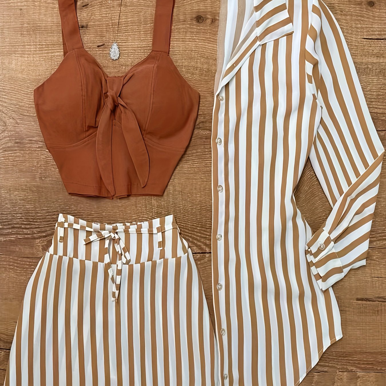 item picture ladies 3pcs resort style brown striped set strappy suspender high waisted half skirt striped shirt multiple ways to wear full of atmosphere this brown striped set is full of resort style the caramel brown strappy suspender has a bow desig