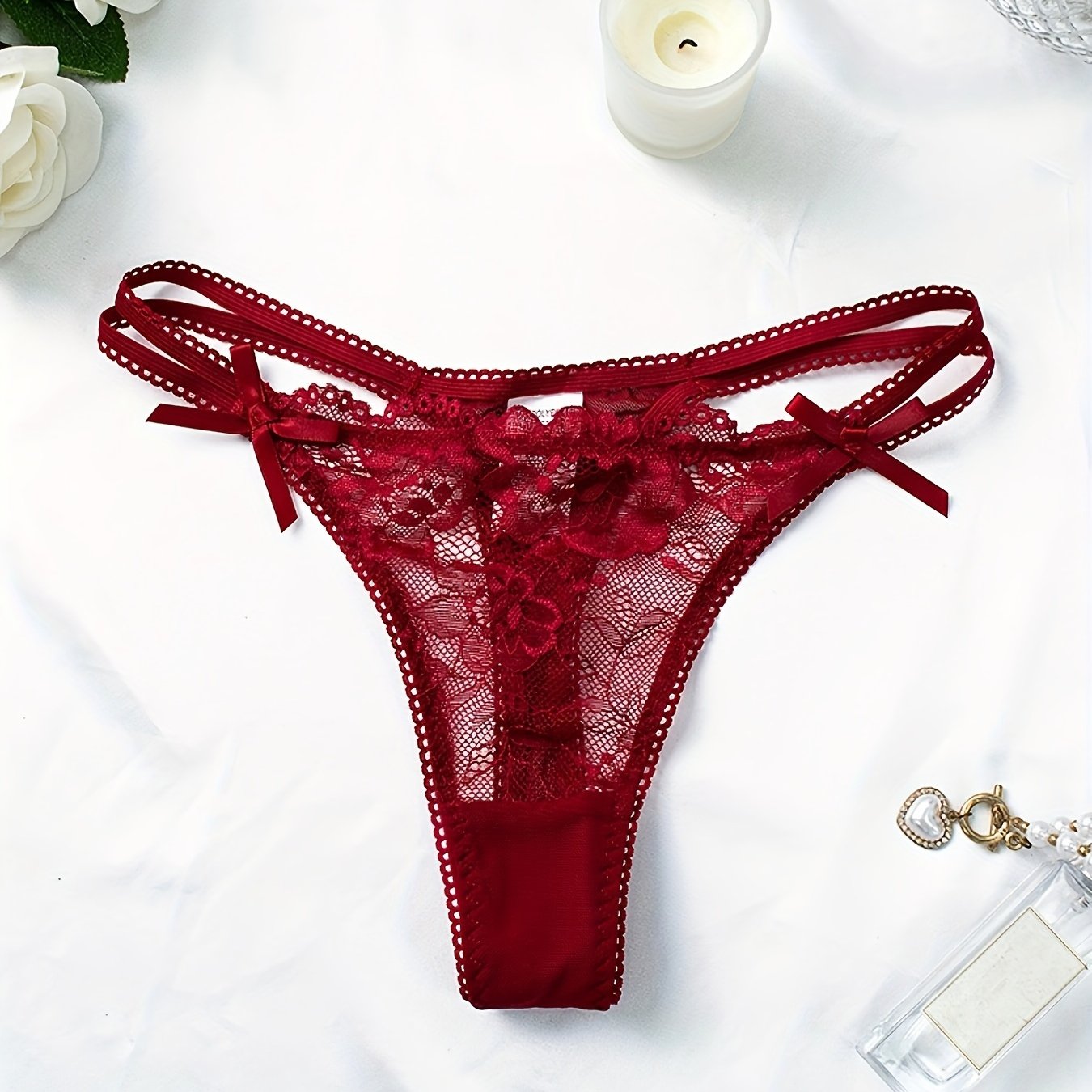 Image of Low-'s Lace Jacquard Thong With Bow And Contrast Lace Straps | Elegant Style, Hipster Design