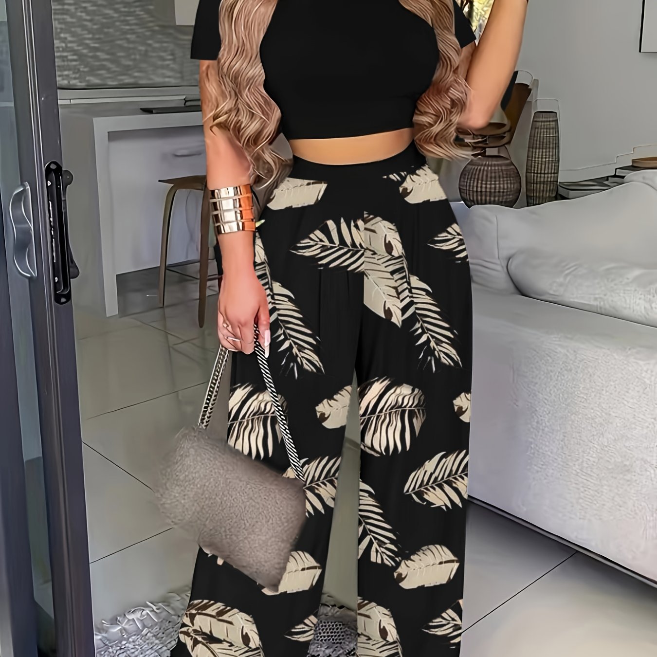 Boho Chic Women&#39;s Two-Piece Set: Solid Black Short Sleeve Crop Top &amp; Tropical Print Wide-Leg Pants - Polyester, Machine Washable, Ideal for Spring/Summer