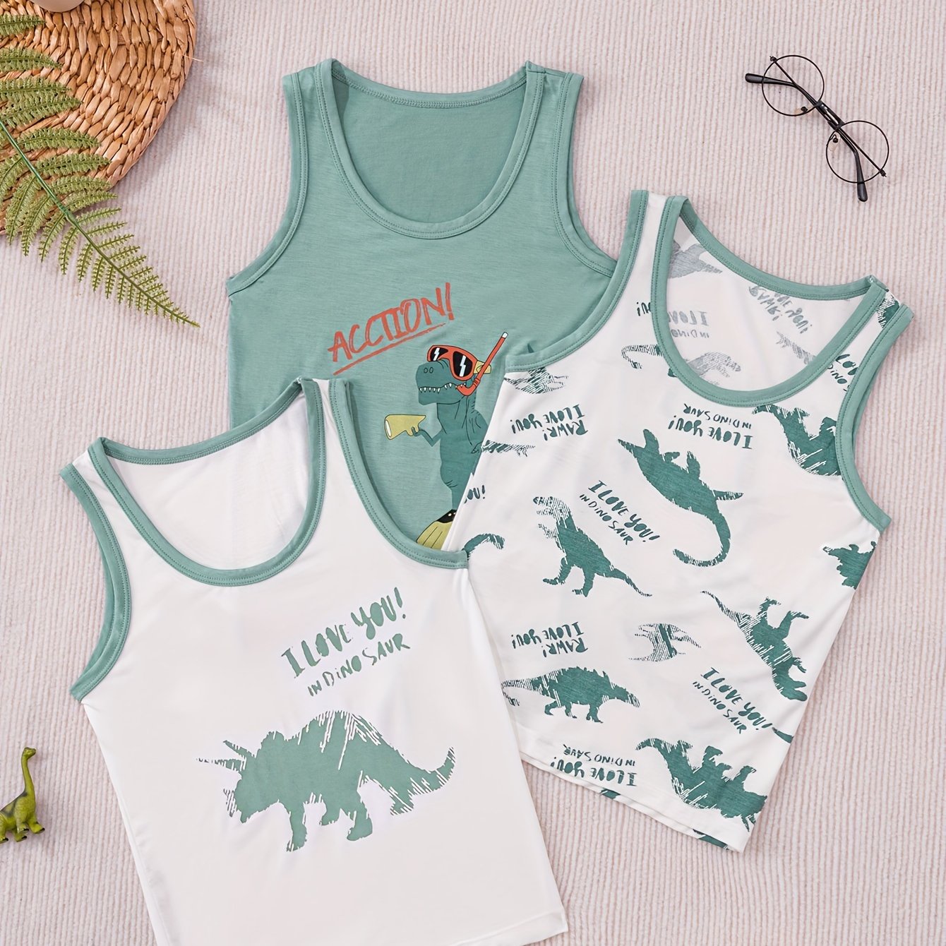 Image of A Set Of 3 Vests For Children Featuring Dinosaur Prints, Made From Breathable And Skin-friendly Materials. Are, Stylish, Resistant To Pilling, Fading, And Deformation. From Fire, Sweat-resistant