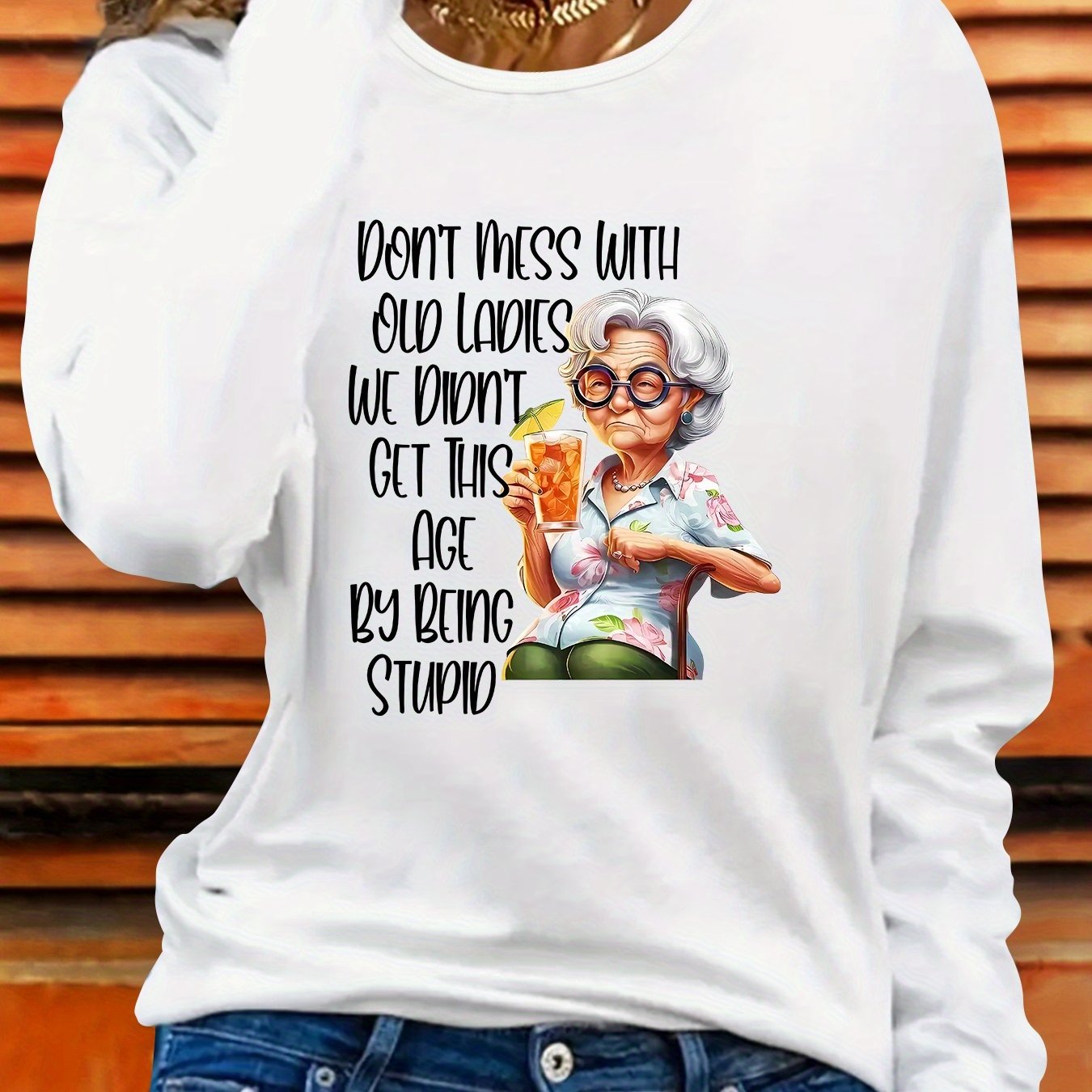 TEMU A Loose-fitting, Versatile, And Fashionable Casual Long-sleeve Top Featuring A Letter On The Left And An Elderly Woman Sitting On The Right